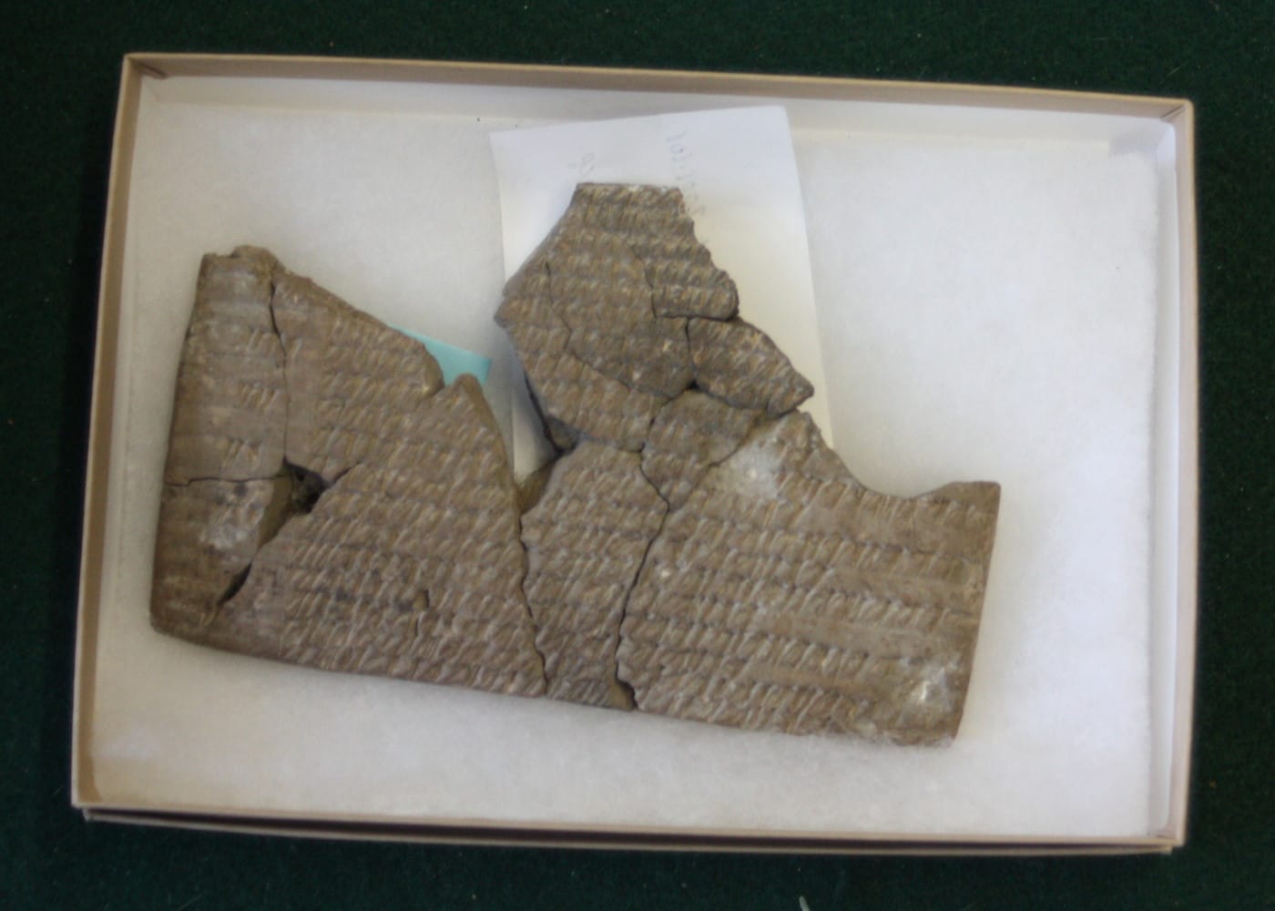 A tablet from the Persepolis Collection on Matthew Stopler's desk at the Oriental Institute at the University of Chicago (all photos by the author for Hyperallergic)
