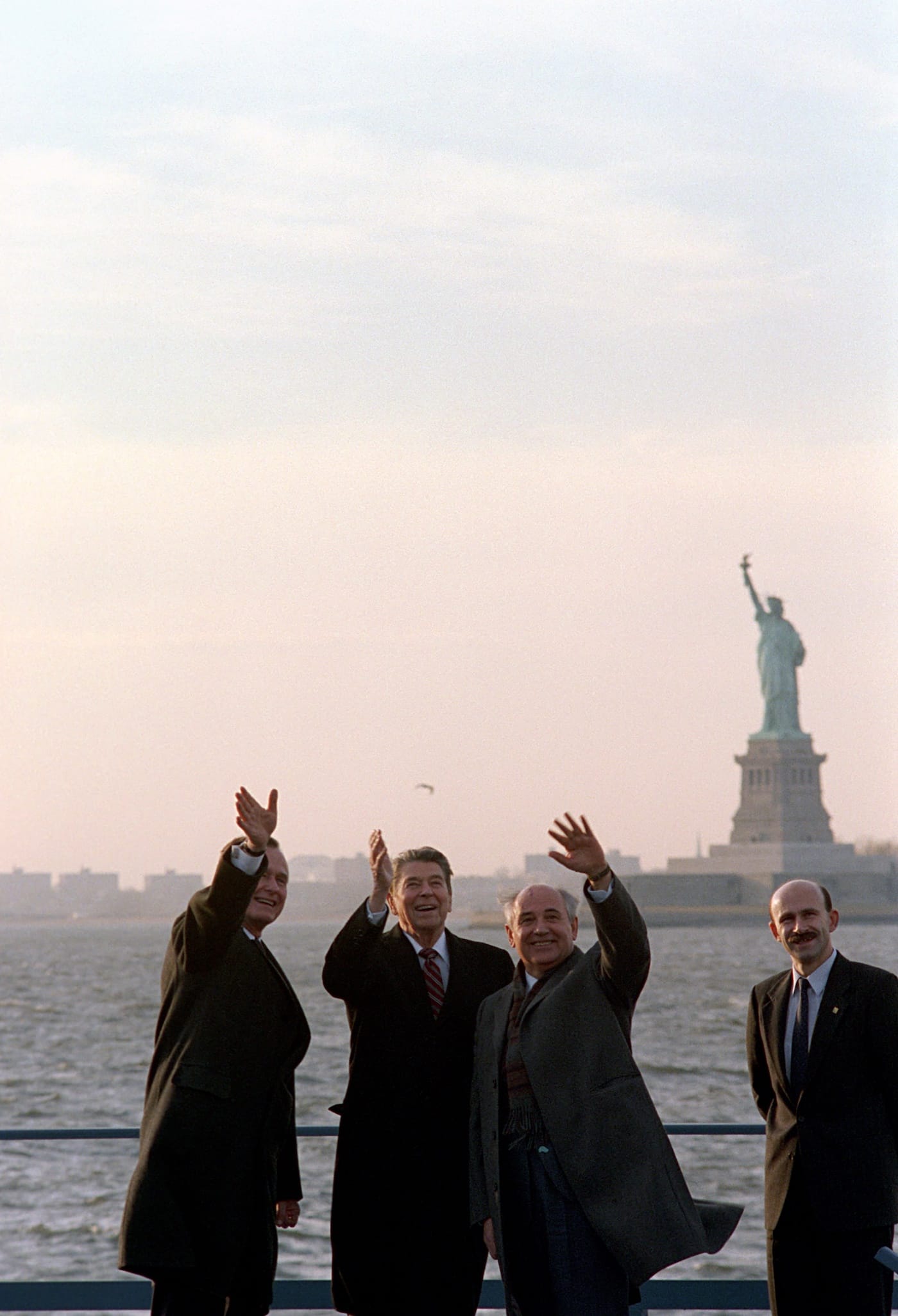 Ronald Reagan, Mikhail Gorbachev, George Bush, and the Statue of Liberty all wave to the press corps (1988), as seen in The Reagan Show, directed by Pacho Velez and Sierra Pettengill. (photo by Susan Biddle, courtesy of the Ronald Reagan Presidential Library; Gravitas Ventures and CNN Films)