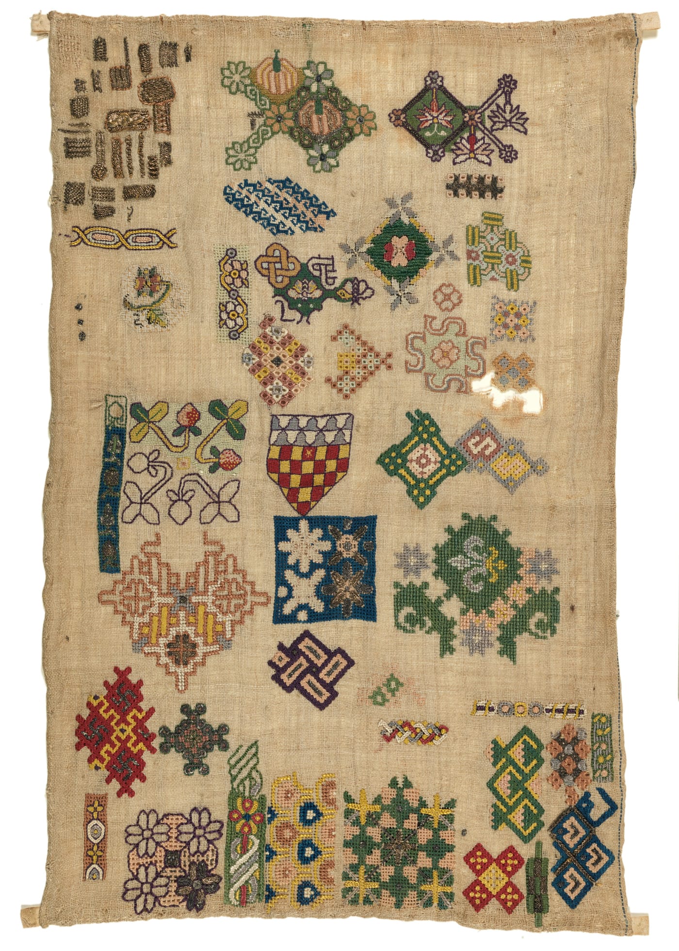 Spot motif sampler (1620–40), initialled "M C" (© The Fitzwilliam Museum, University of Cambridge)