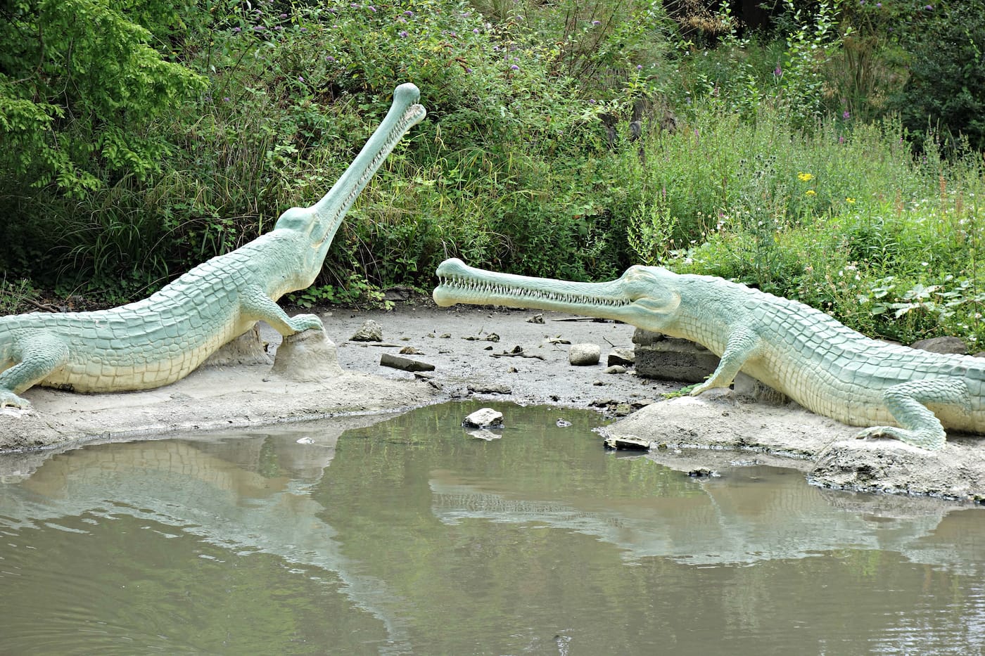 Dinosaur sculptures in Crystal Palace Park, London (photo by the author for Hyperallergic)