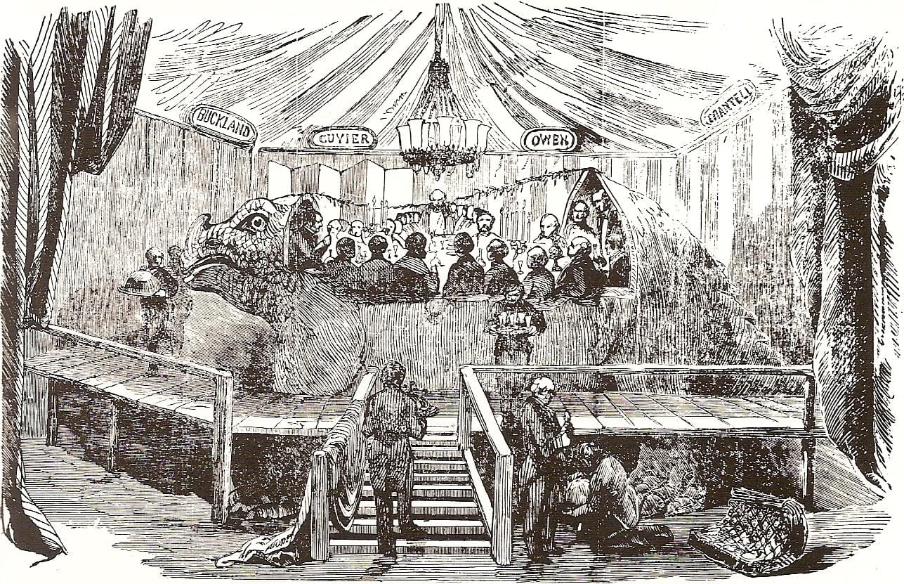 The dinner in the Crystal Palace Iguanodon, pictured in The Illustrated Encyclopaedia of Dinosaurs (1854) (via Wikimedia)