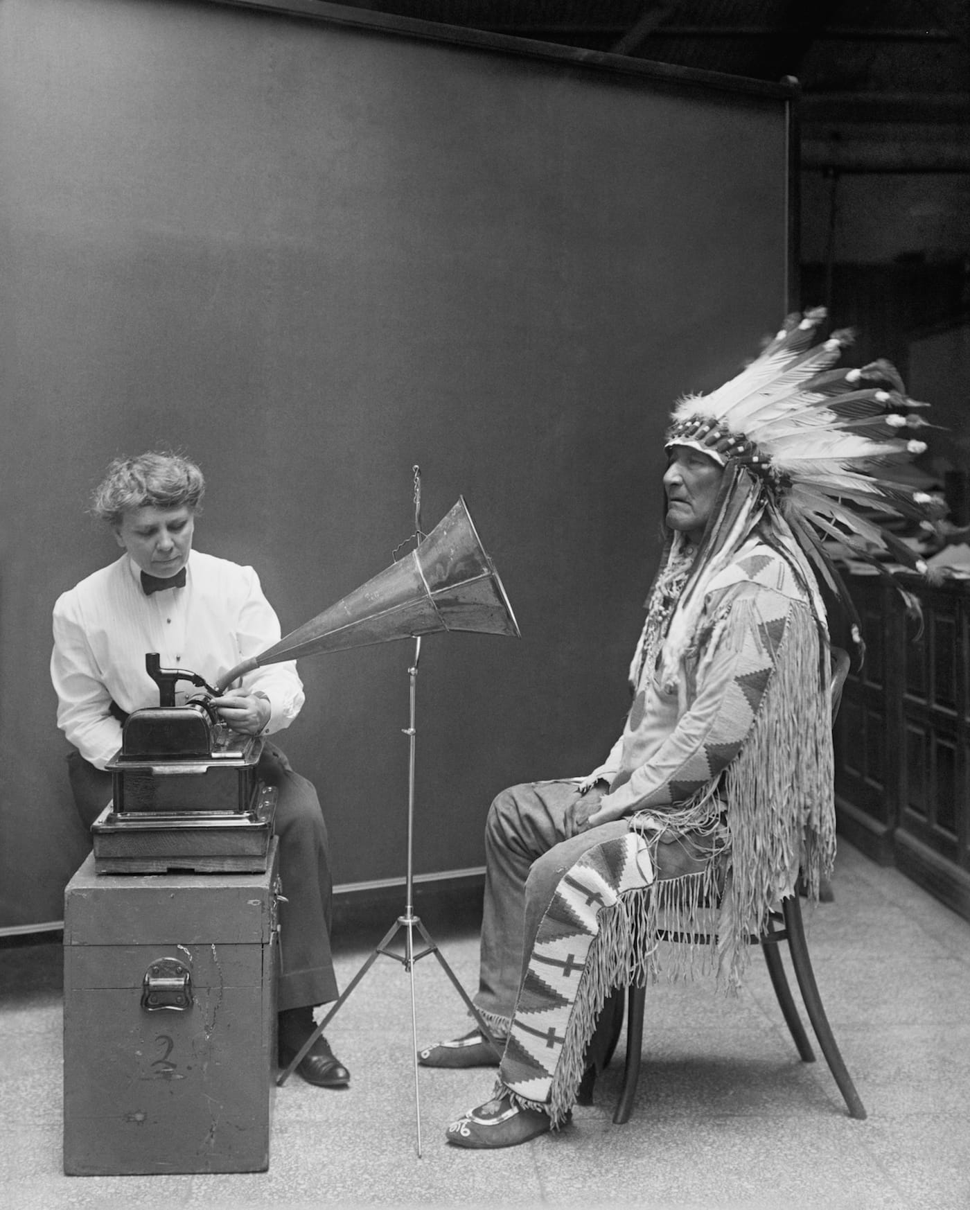 Frances Densmore at the Smithsonian Institution in 1916 during a recording session with Blackfoot chief Mountain Chief for the Bureau of American Ethnology (February 9, 1916) (via Library of Congress/Wikimedia)