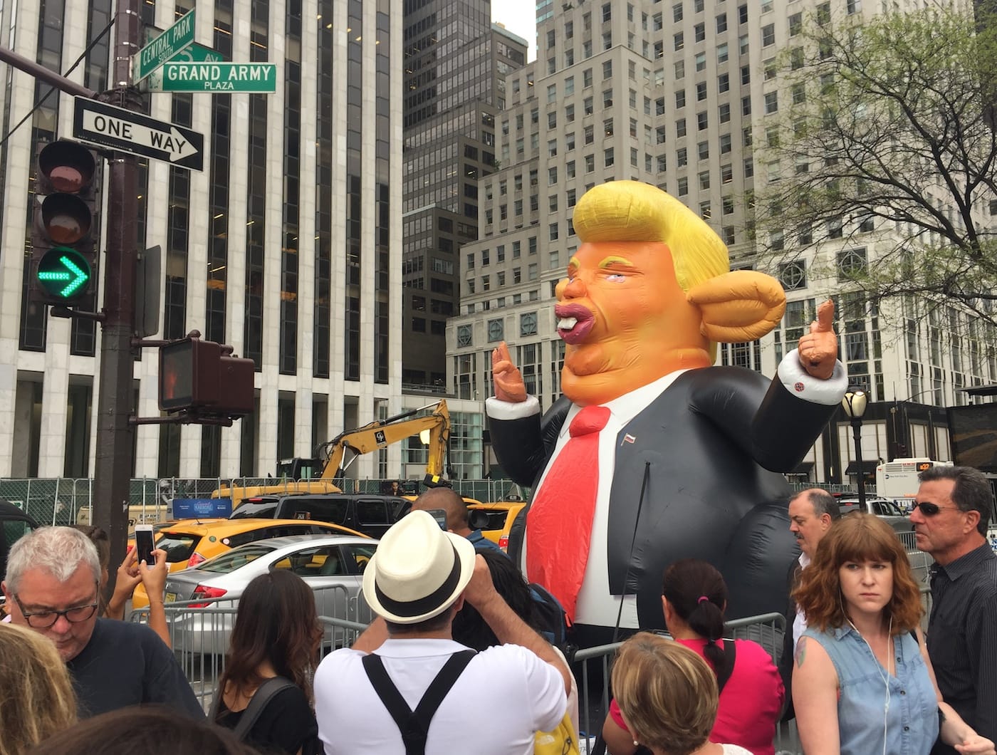 Artist Jeffrey Beebe Trumpy the Rat, produced with BravinLee projects, stationed in Grand Army Plaza during the August 14 protests at Trump Tower