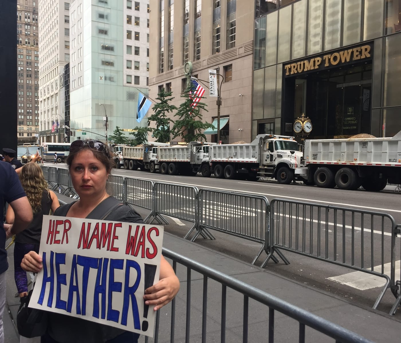 A protester at Trump Tower on Monday, August 14