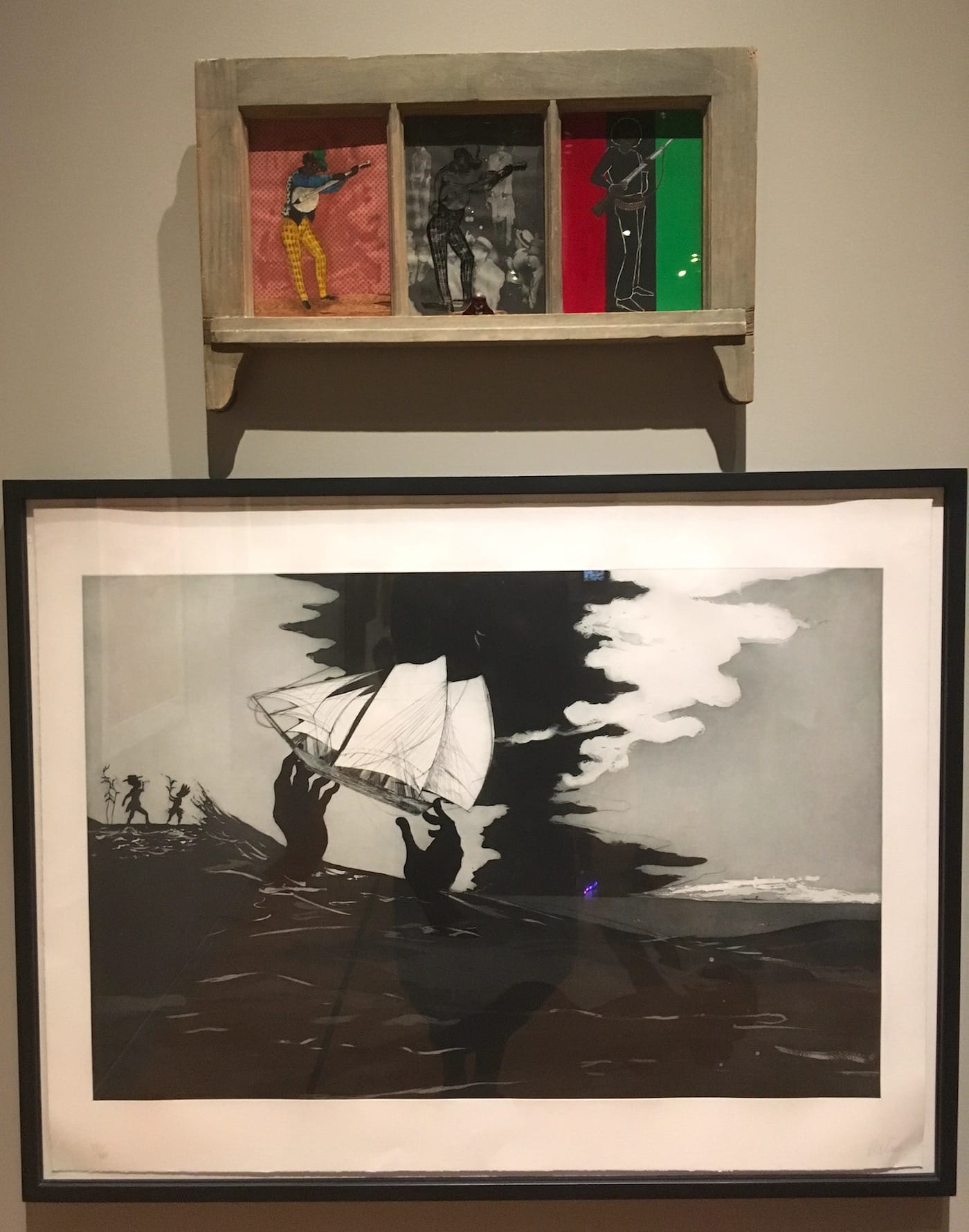Betye Saar, "Let Me Entertain You" (1972, top) and Kara Walker, "no world" (2010, bottom) at the National Museum of African American History and Culture (photo by the author for Hyperallergic)