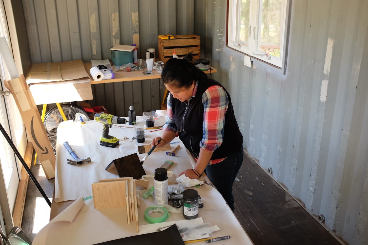 Artist Hannah Israel in her studio at AIR Serenbe (photo by Brandon Hinman, courtesy AIR Serenbe)