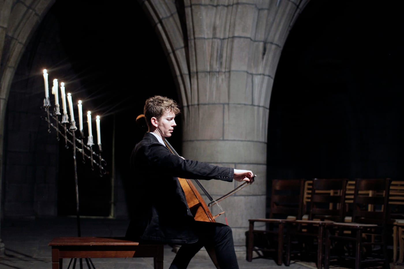 Joshua Roman performing at the Crypt Sessions (photo by Andrew Ousley)