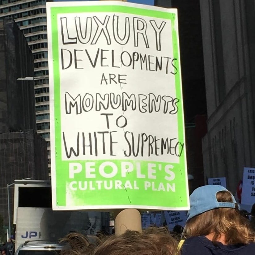 A People's Cultural Plan sign at a protest