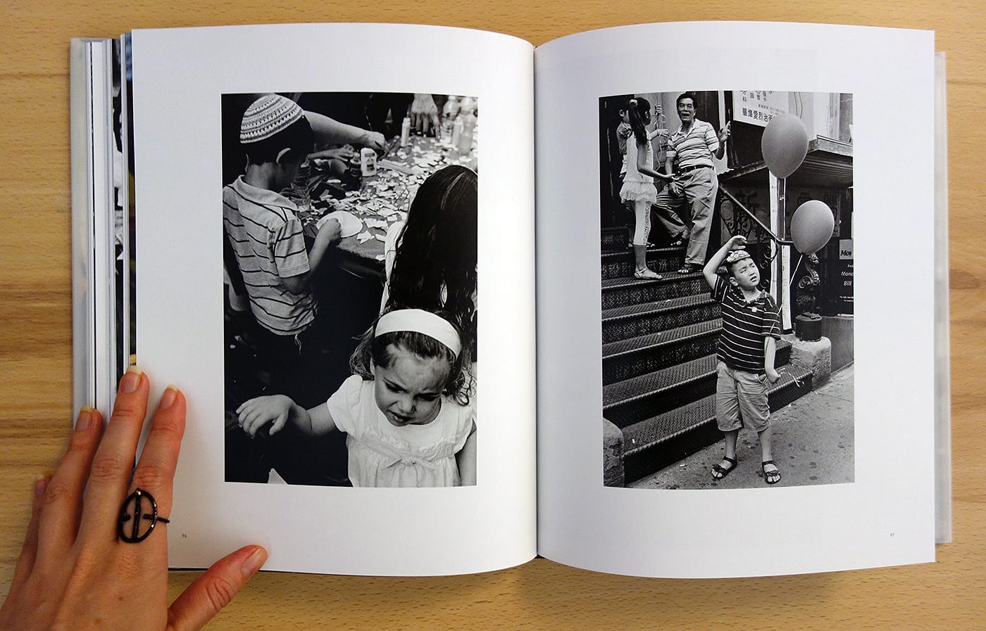 Pages from Remnants: Photographs of the Lower East Side (photo of the book for Hyperallergic)