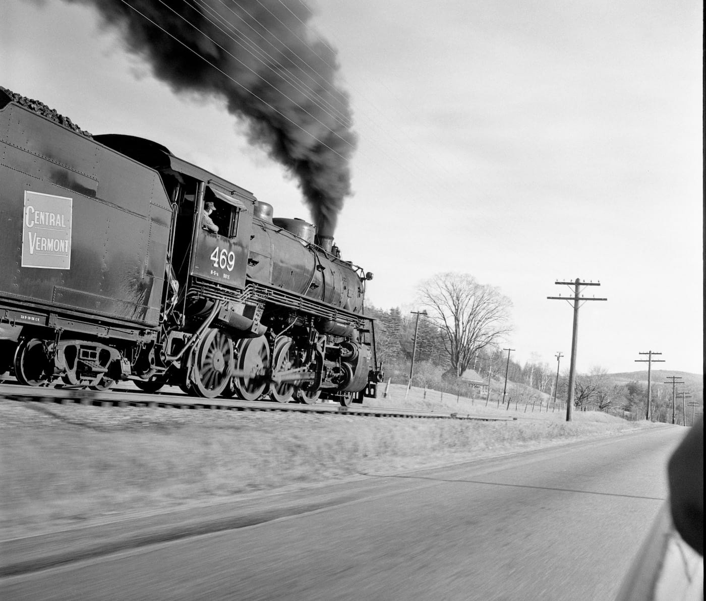 Jim Shaughnessy, "Central Vermont local freight at speed between St. Albans and White River Junction, Vermont" (1955) (courtesy the artist and Thames & Hudson)