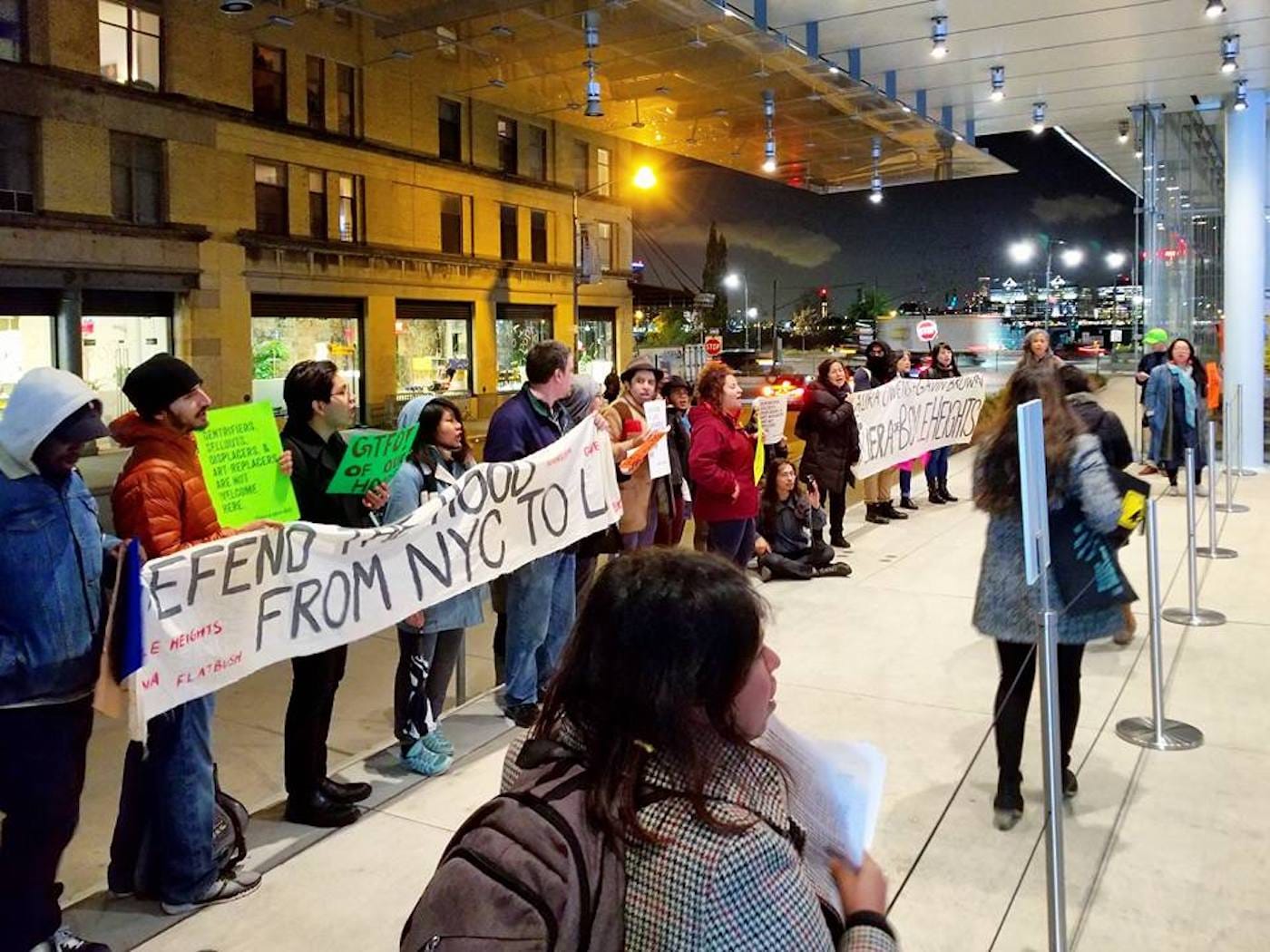 Members of Boyle Heights Alliance Against Artwashing and Displacement (BHAAAD) and other anti-gentrification groups rallying outside the Whitney Museum during Laura Owens's opening on Wednesday, November 8. (photo courtesy BHAAAD)