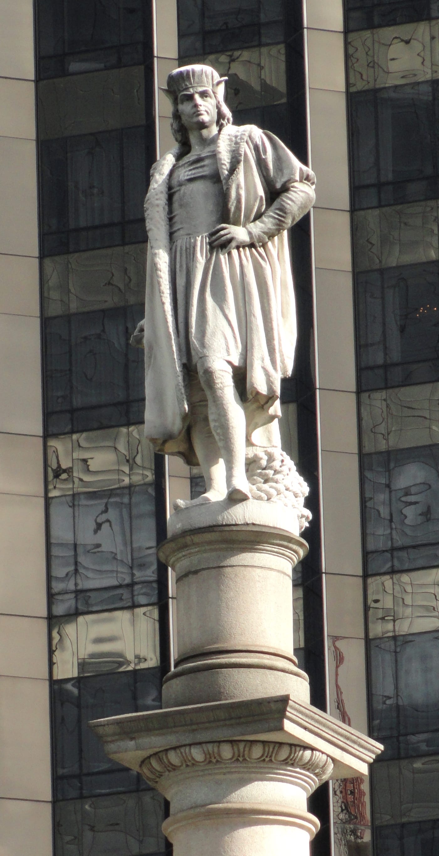 The statue of Christopher Columbus atop the monument in Columbus Circle (photo by Daderot, via Wikimedia Commons)