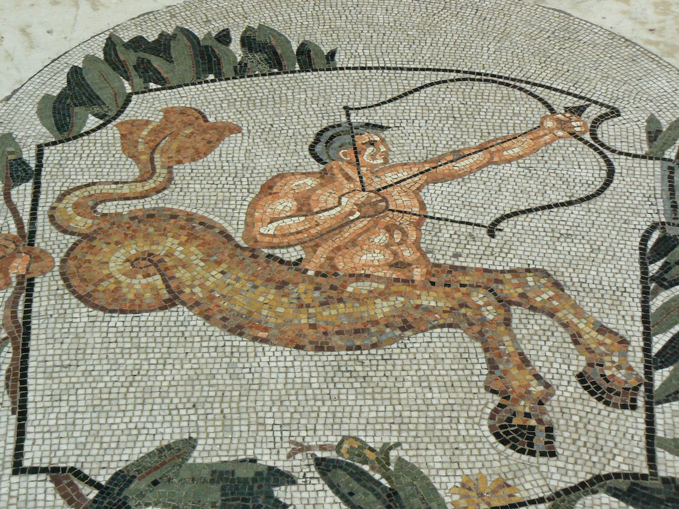A sagittarius mosaic at the Galleria Umberto I in Naples (photo by Pascal Radigue, via Wikimedia Commons)
