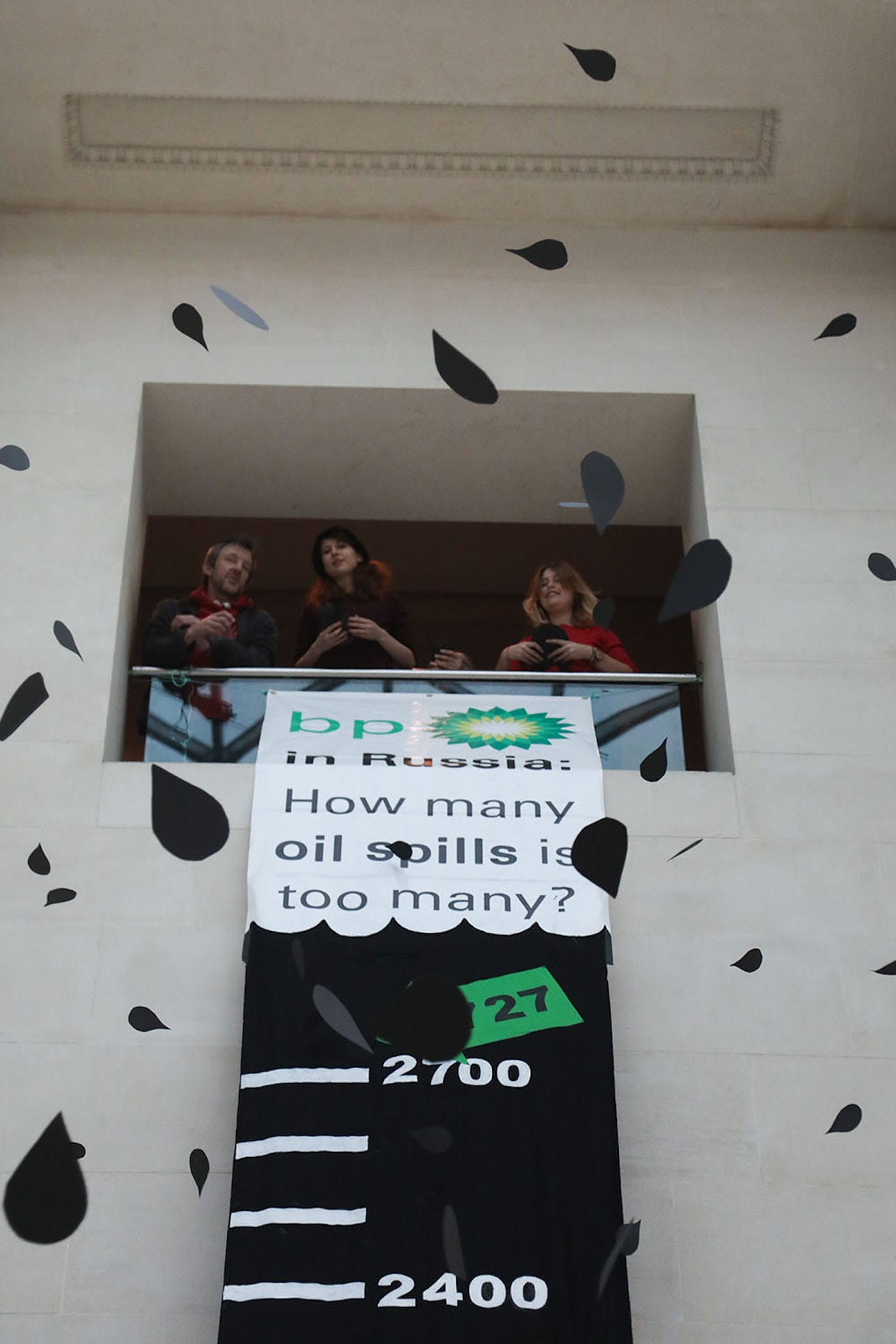 Activist theater group BP Or Not BP? drop thousands of paper oil drops in the British Museum in protest of BP's sponsorship of the museum. (photo by Kristian Buus, courtesy BP Or Not BP?)