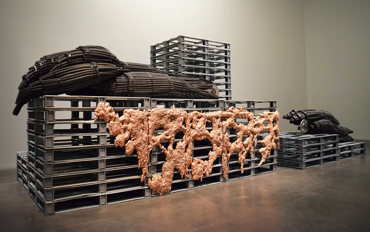 KERNEL (Pegy Zali, Petros Moris, and Theodoros Giannakis), "As you said, things resist and things are resistant" (2018), mixed media installation with aluminum pallets, copper-plated acrylic resin, foam cable-jackets, steel, and robotic mechanism