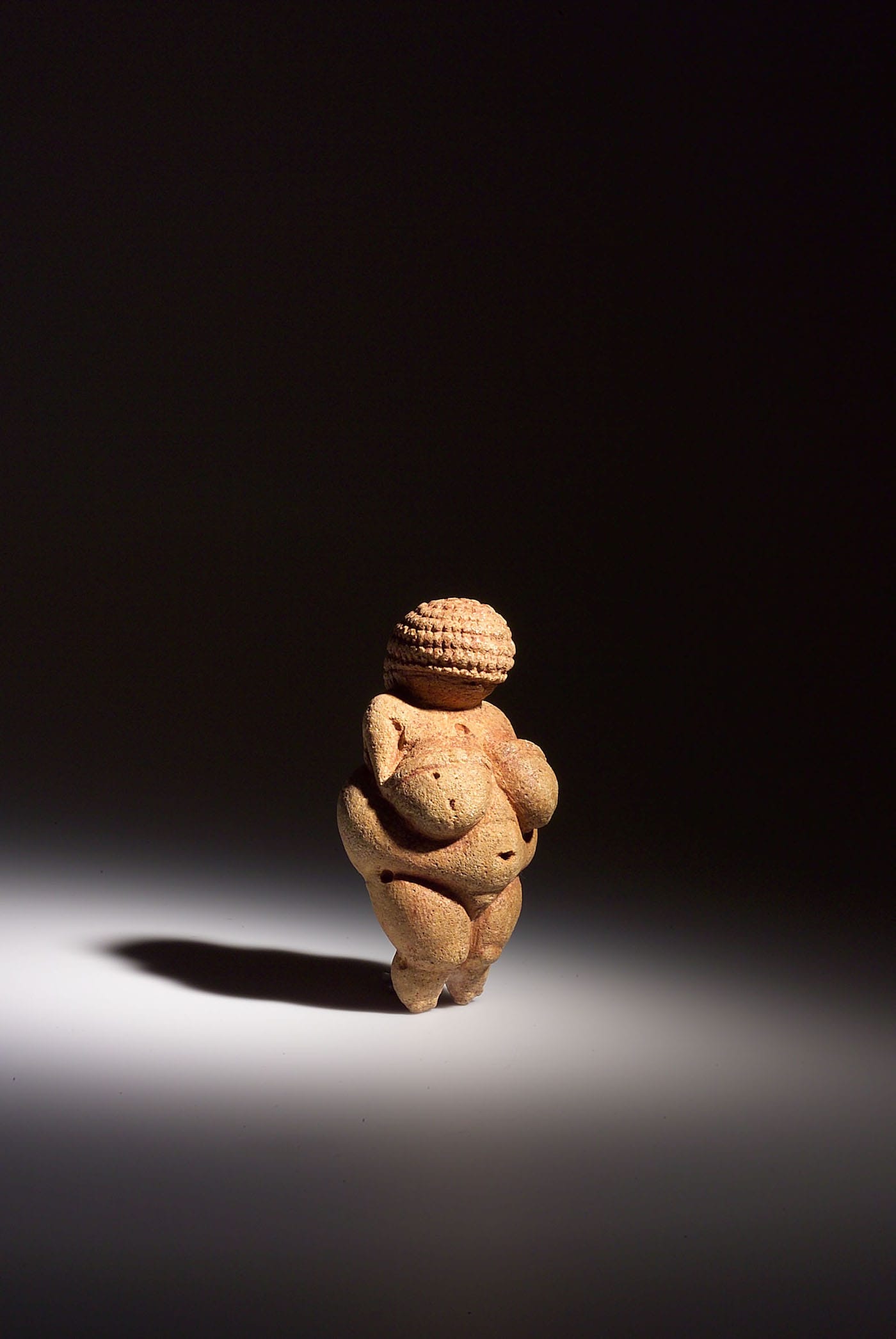 The Venus of Willendorf (ca 28,000–25,000 BCE), limestone (photo courtesy and © the Naturhistorisches Museum Wien)