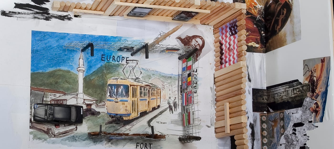 Jean-Luc Godard, "The Bastards (parable) – God is my right" (2004–06), foamcore, watercolor, paper collage, felt pen, Plexiglass, lamp, model car, metal wire, wood, glue, steel, lamp, and mixed media, Rainbow Transvideo monitor, three MP3 iPod video players showing excerpts from two John Ford Westerns and the JAG TV show, 13 3/4 x 44 1/2 x 42 in (courtesy of Miguel Abreu Gallery)