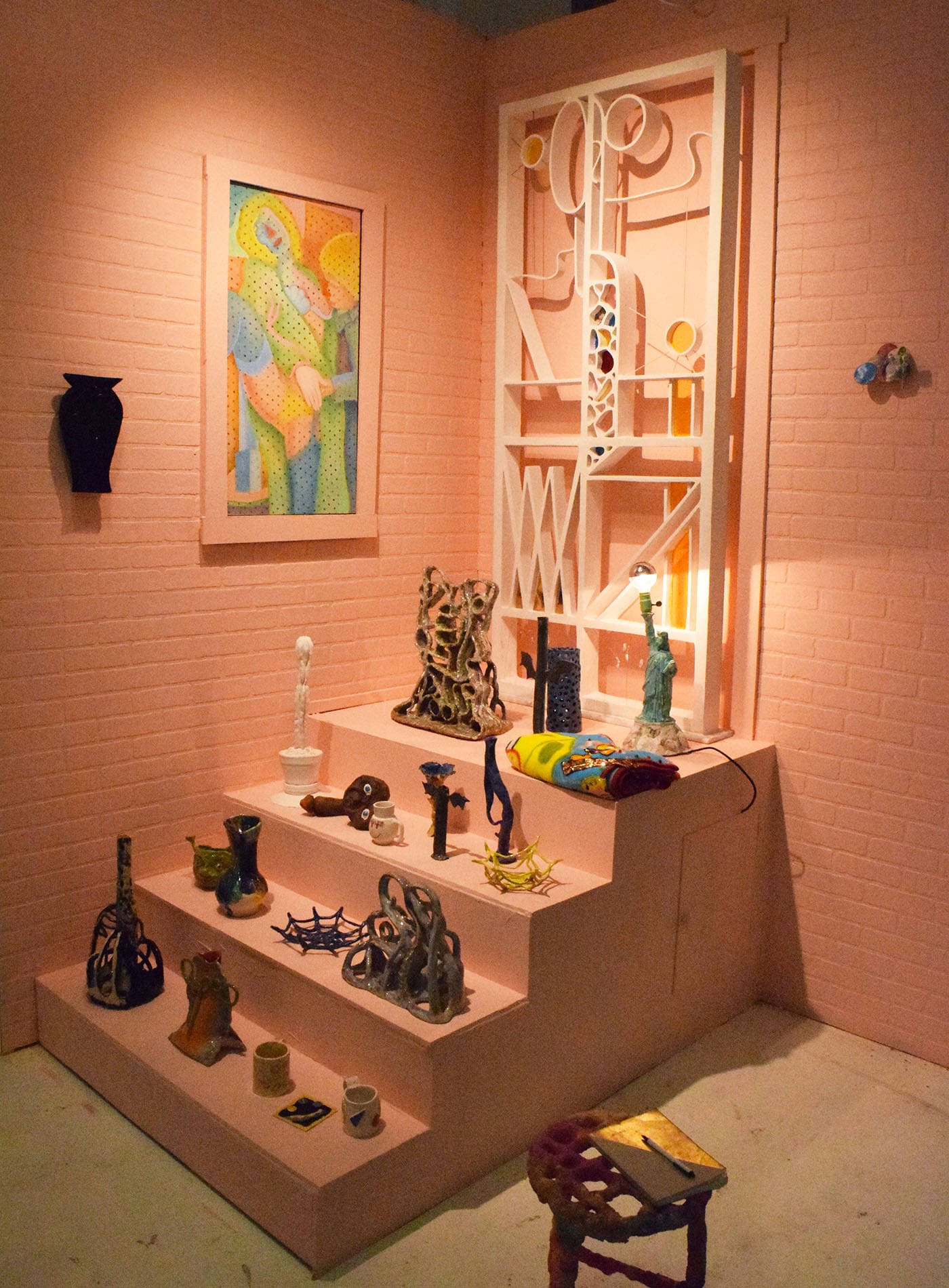 The Essex Flowers booth is a faux, pink stoop.