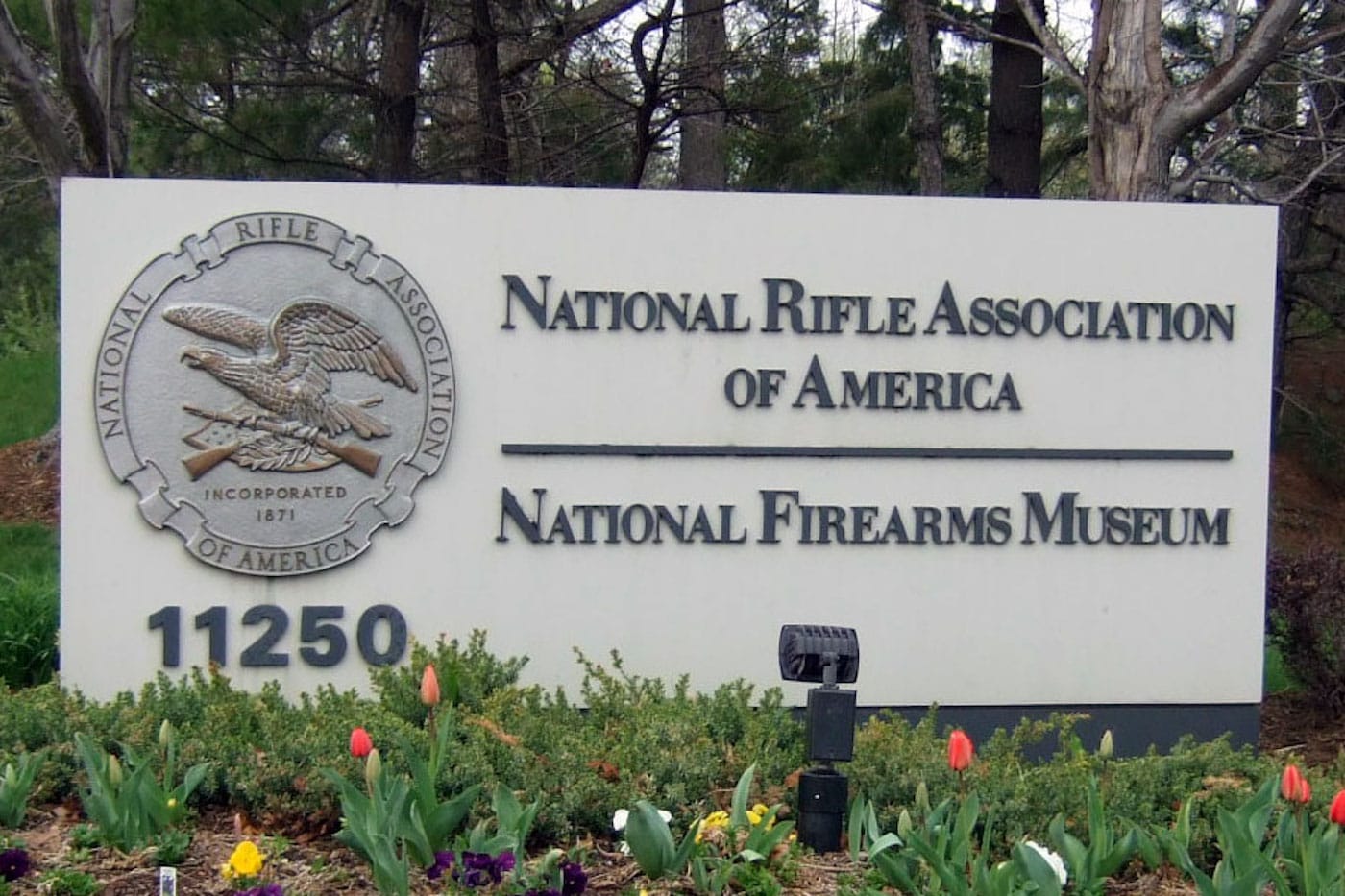 The sign for the National Rifle Association headquarters and National Firearm Museum in Fairfax, Virginia (photo by Joe Loong/Flickr)