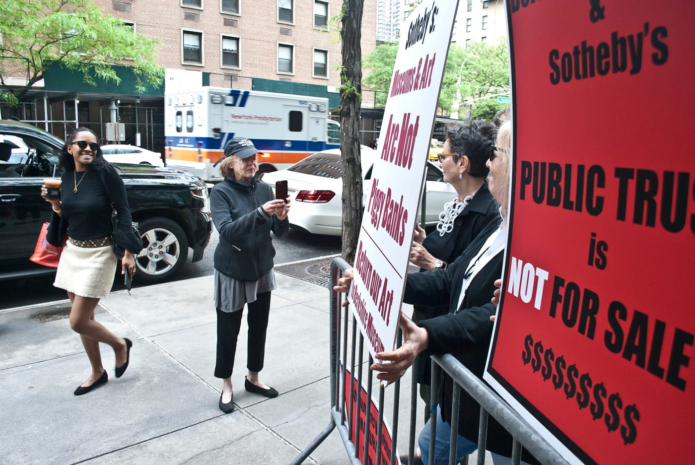 Demonstrators from Save the Art – Save the Museum protest the sale of Berkshire Museum artworks at Sotheby's
