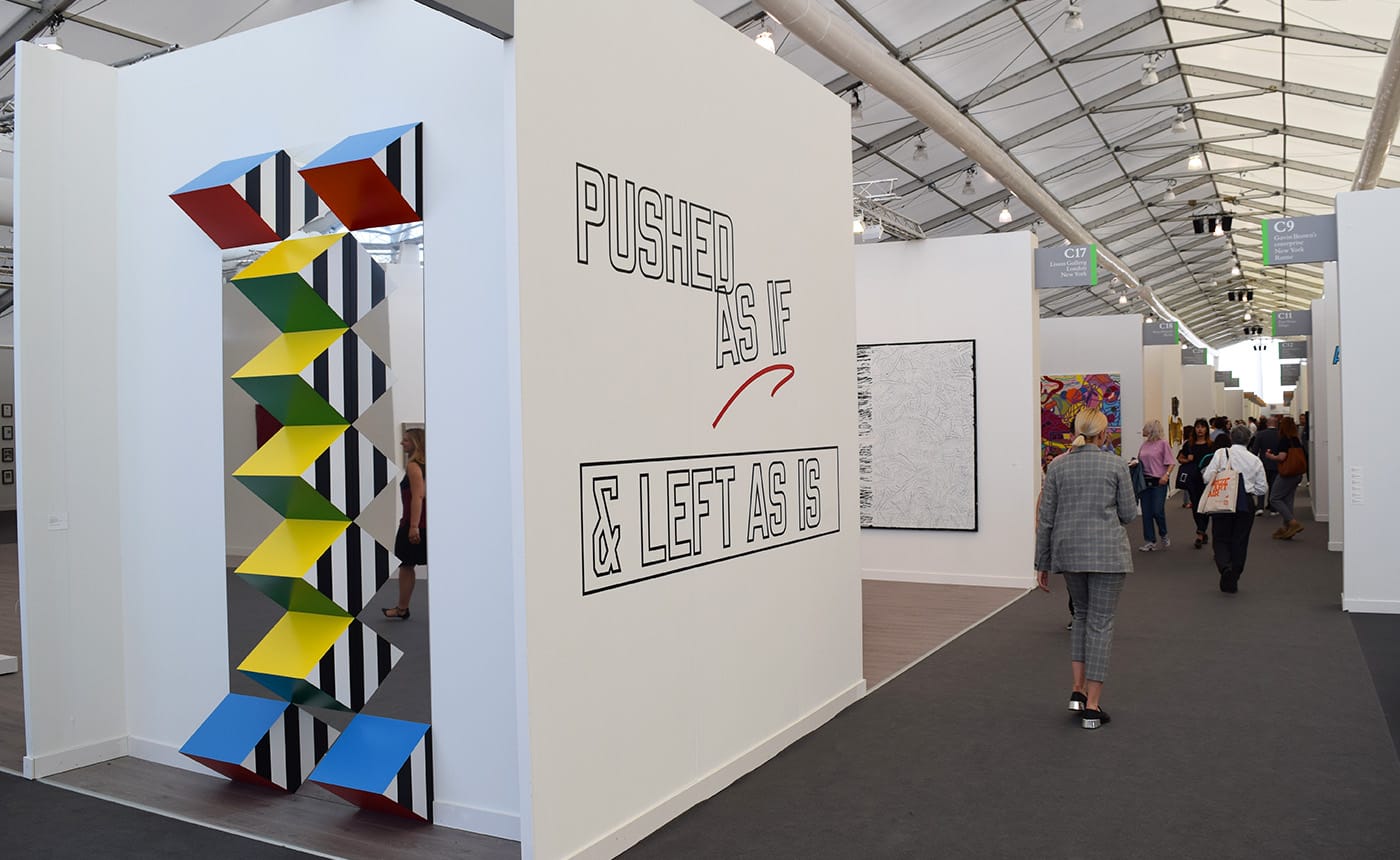 Works by Daniel Buren and Lawrence Weiner on the exterior of the Lisson Gallery booth at Frieze New York (all photos by the author for Hyperallergic)