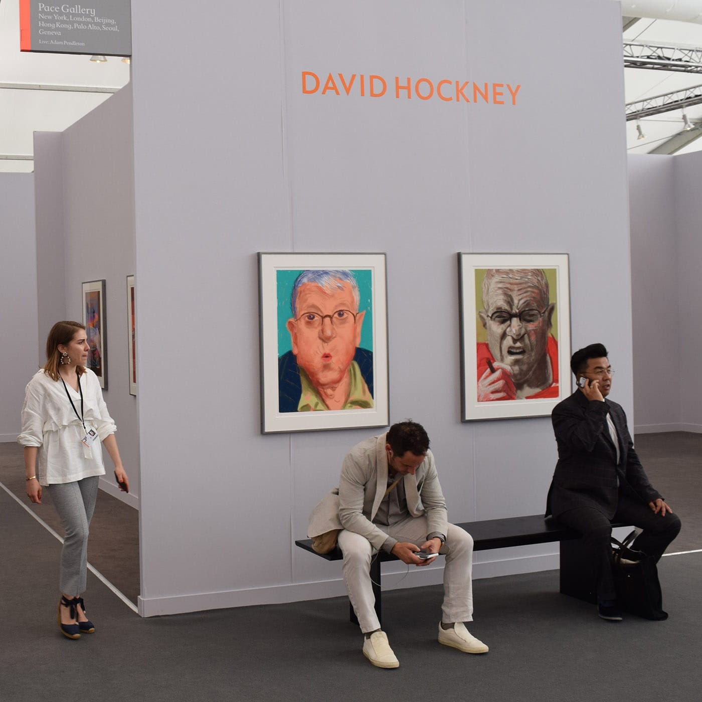 Exterior view of Pace Gallery's booth of iPad and iPhone drawings by David Hockney