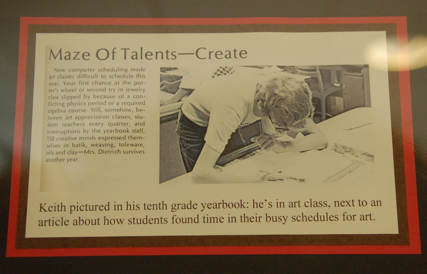 A yearbook photo of Keith Haring on display in a case at Kutztown Middle School