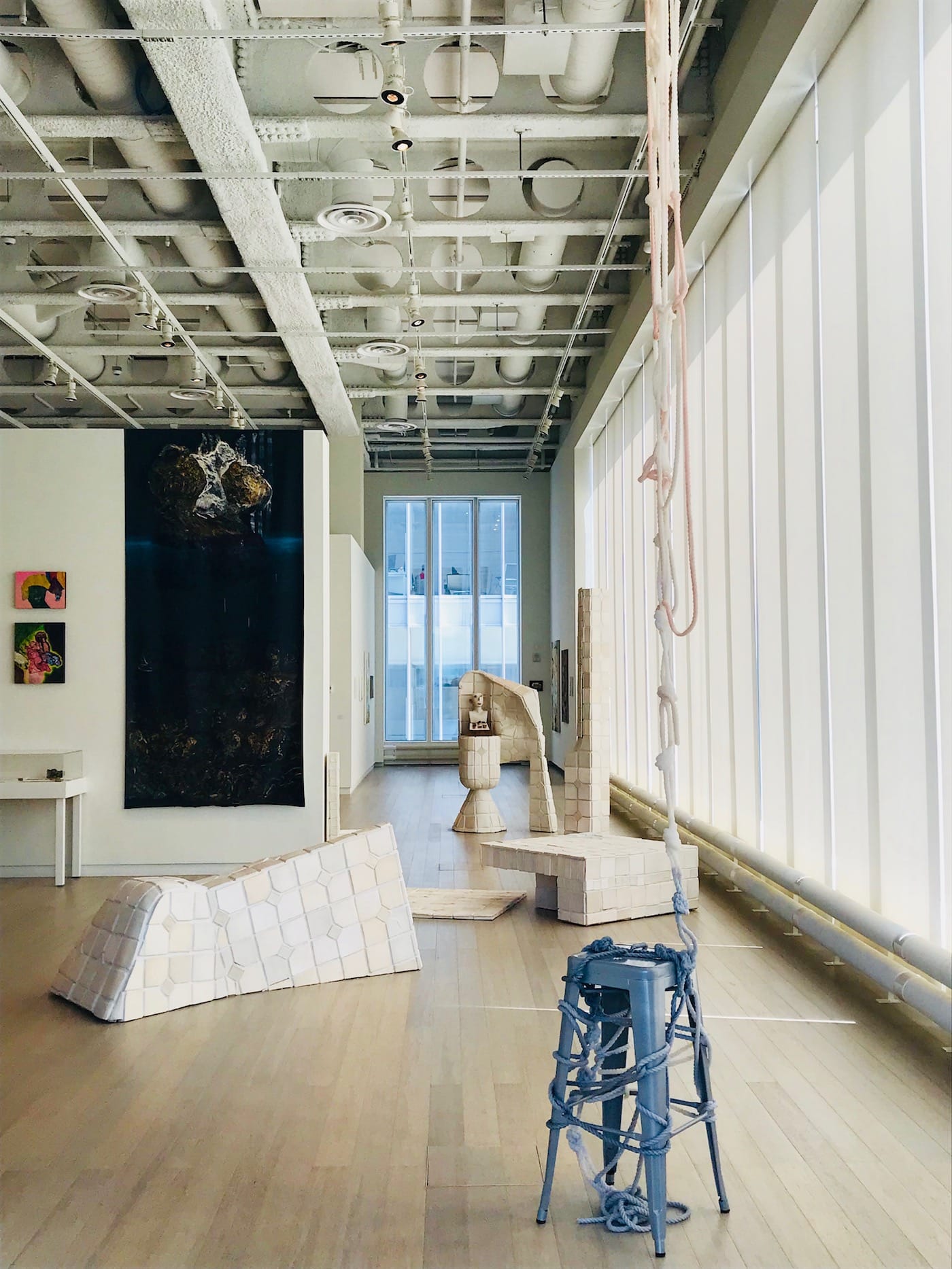 Installation view of the 2018 Columbia Visual Arts MFA Thesis exhibition at the Wallach Art Gallery (photo by Zachary Small for Hyperallergic)