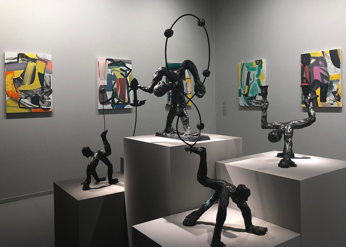 Sculptures by Andrew Lord and paintings by Amy Sillman in the Gladstone booth at TEFAF New York