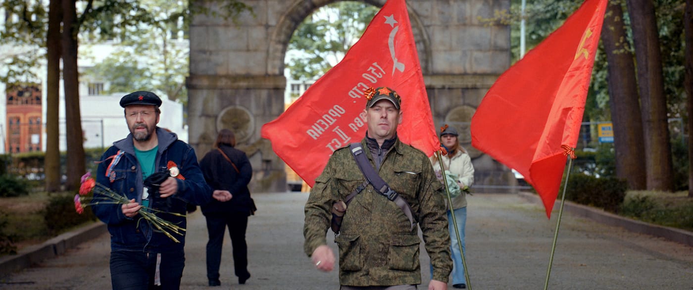 Flags, red carnations, and St. George ribbons are the accouterments of the revelers in <em>Victory Day</em> (2018)