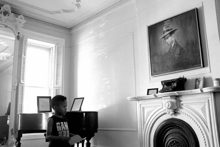Zion (age 6) sharing a poem in the Summer Block Party in the Langston Hughes House (courtesy of I, Too Arts Collective; photo by David Flores)