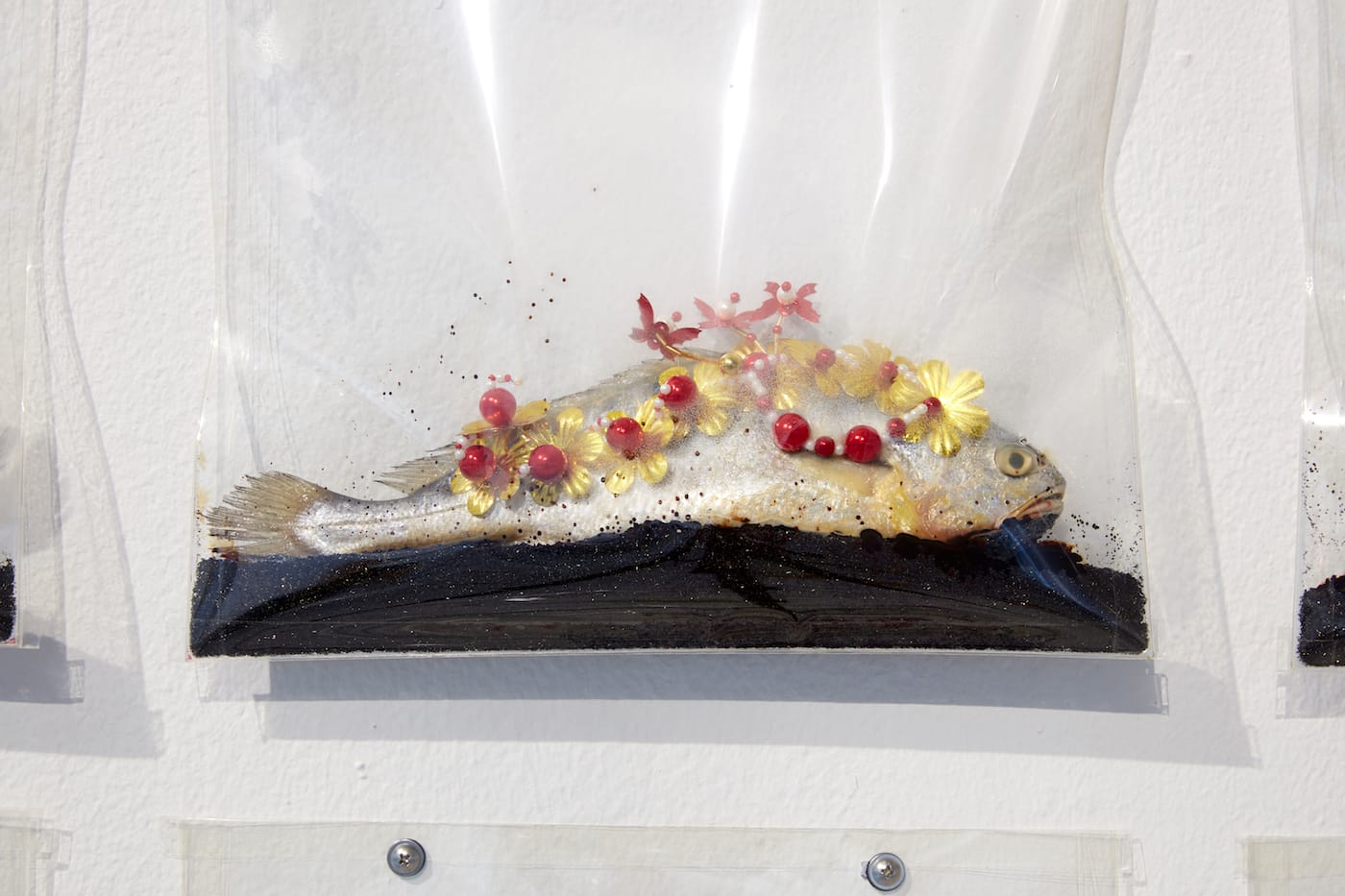 Lee Bul, "Majestic Splendor" (2016, detail), installation view, <em/>Connect 1: Still Acts, Art Sonje Center, Seoul; fish, sequins, potassium permanganate, mylar bags, dimensions variable (photo by Sang-tae Kim; image courtesy of Art Sonje Center)