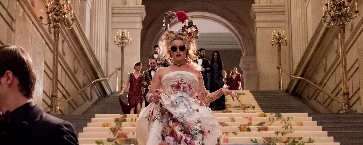 Helena Bonham Carter descends the Metropolitan Museum's main staircase in a scene from <em>Ocean's 8</em> (image courtesy of Warner Bros. Entertainment Inc.) 