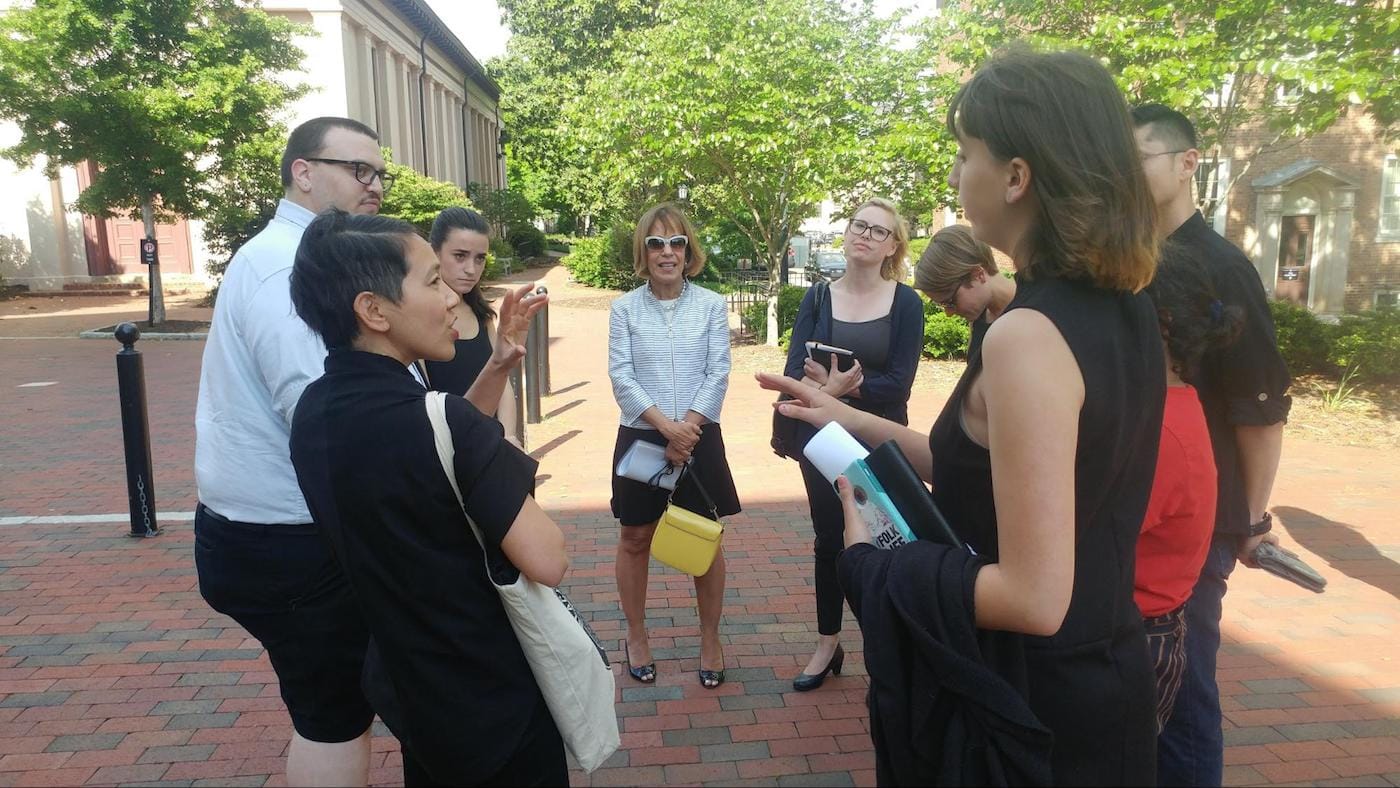 ART HERE student organizers and faculty liaison Hong-An Truong (left) continue discussions with Chancellor Folt (center) following the Faculty Executive Committee Meeting on May. (photo by the author)