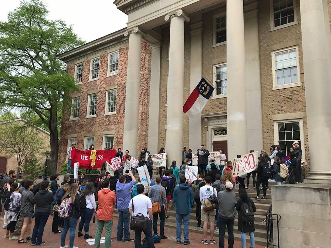 University of North Carolina, Chapel Hill art and humanities students, alongside Graduate Student Union UE 150, gathered outside Chancellor Folt’s Office. (photo by Kelsey Martin)