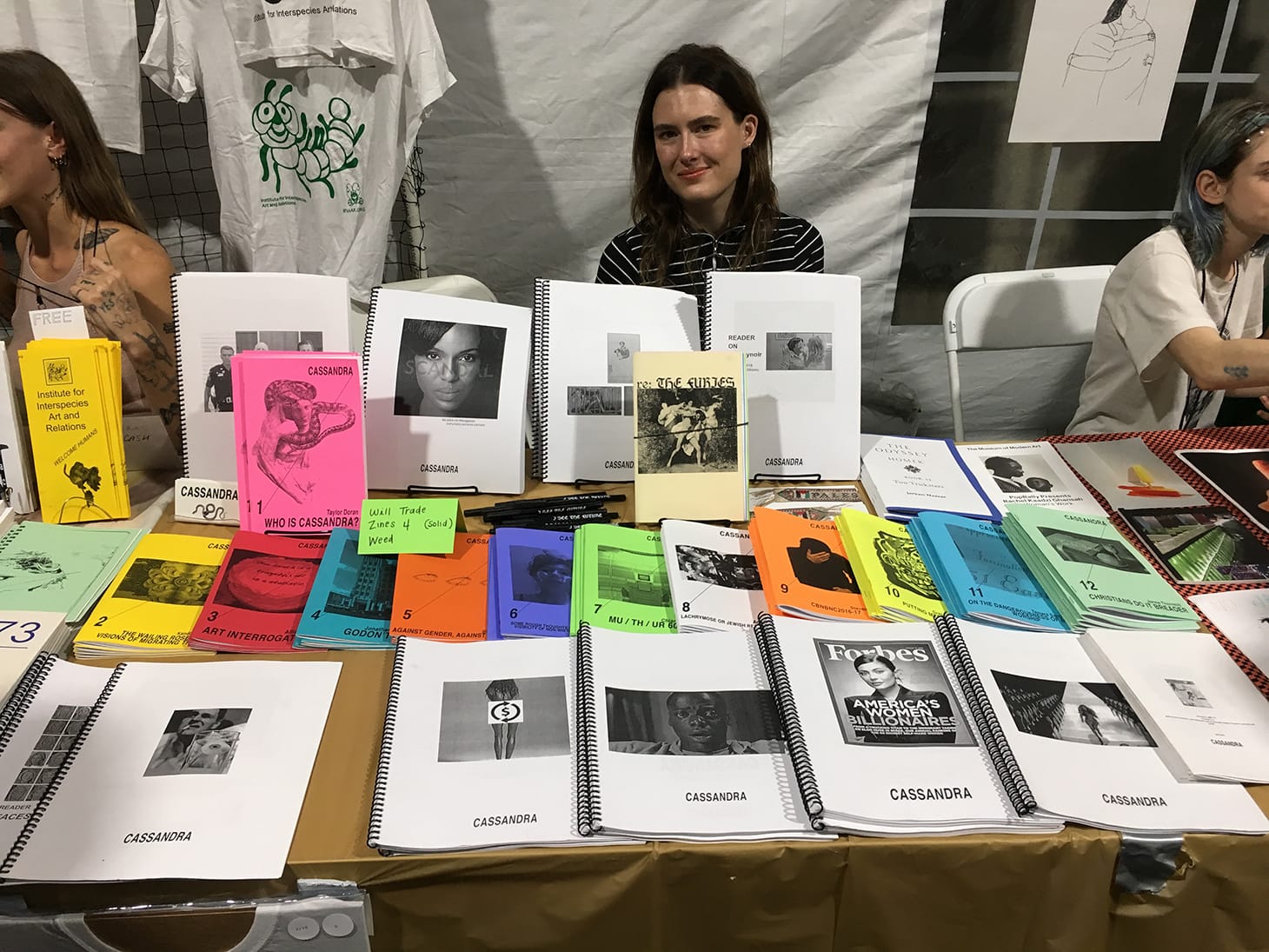 Taylor Doran at the table for Cassandra Press