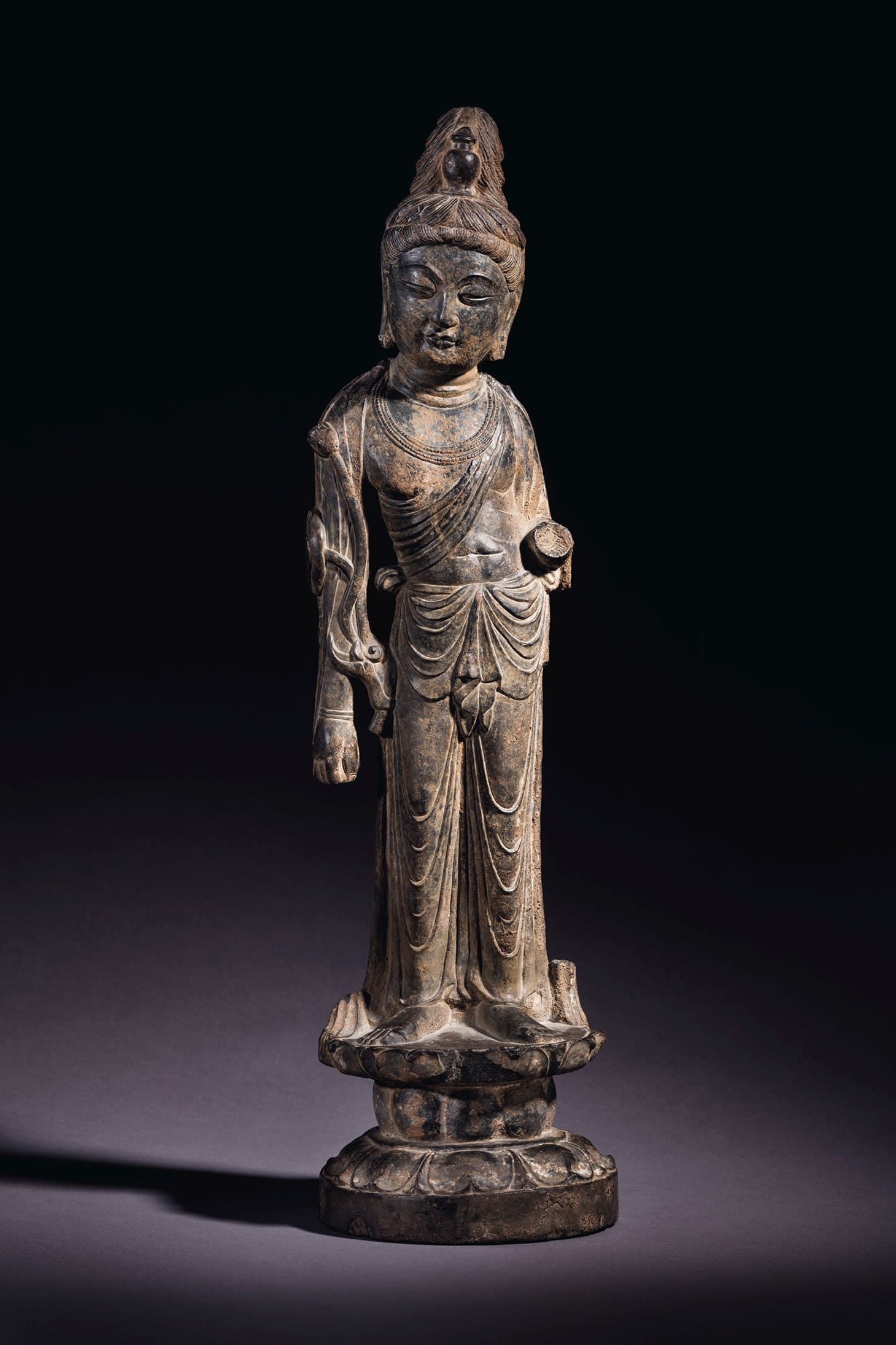 An important and very rare grey limestone figure of Mahasthamaprapta (early Tang Dynasty, eighth century), 26 3/8 inches high (image courtesy Christie's)