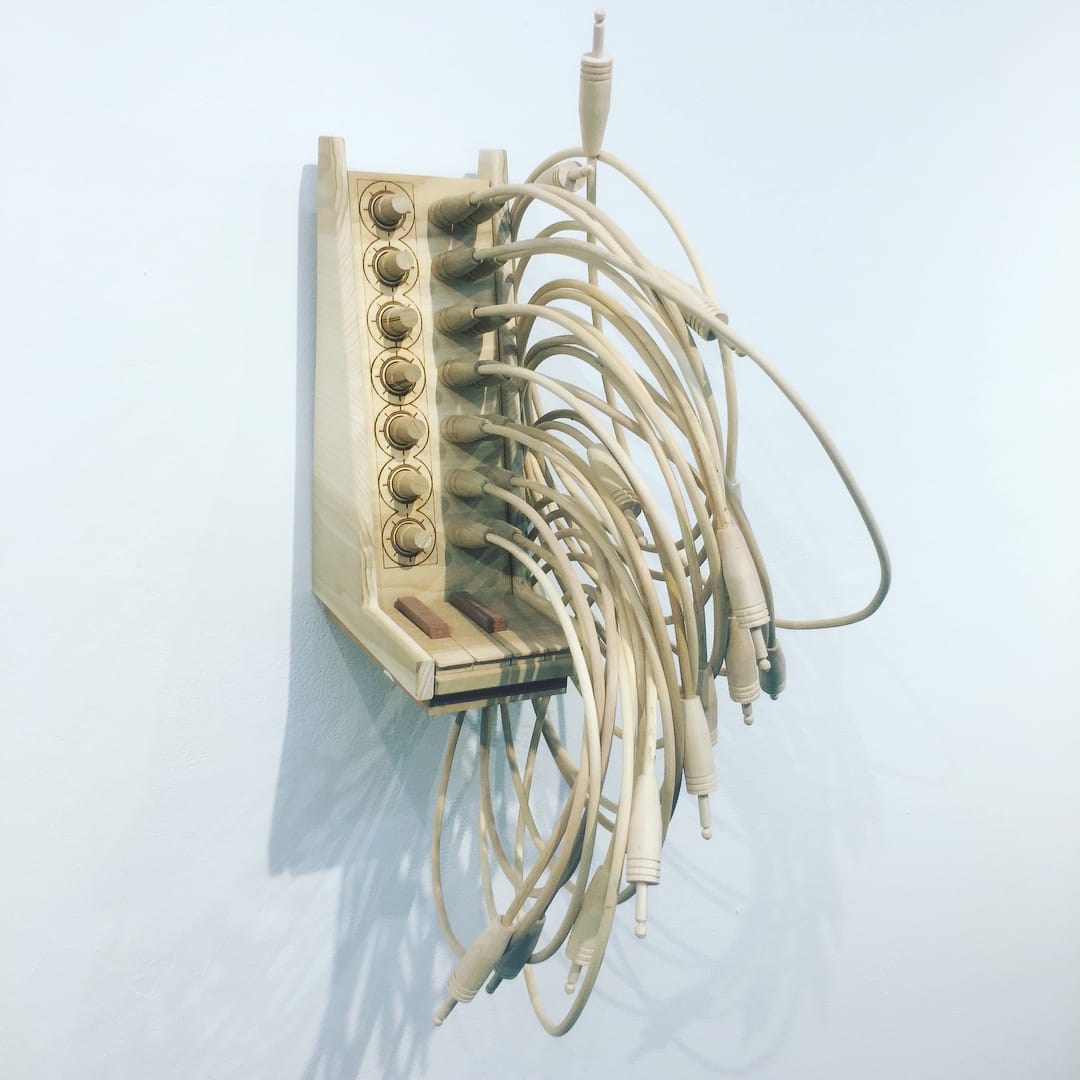 Craig Kaths (2017). Poplar, oak, sapele, and glue. 12" x 14" x 22". Sourced via artist's Instagram account.