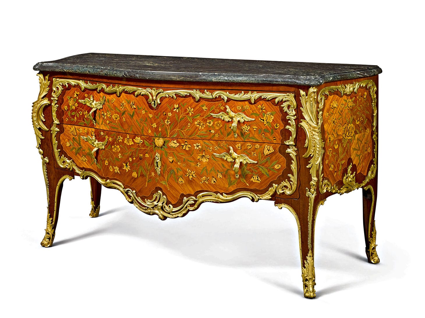 Mathieu Criaerd, a Louis XV gilt bronze-mounted tulipwood, amaranth and marquetry commode (c. 1755) with a Levanto marble top, some mounts with the crowned C mark, height 36 inches, width 65 inches, depth 28 inches (image courtesy Christie's)