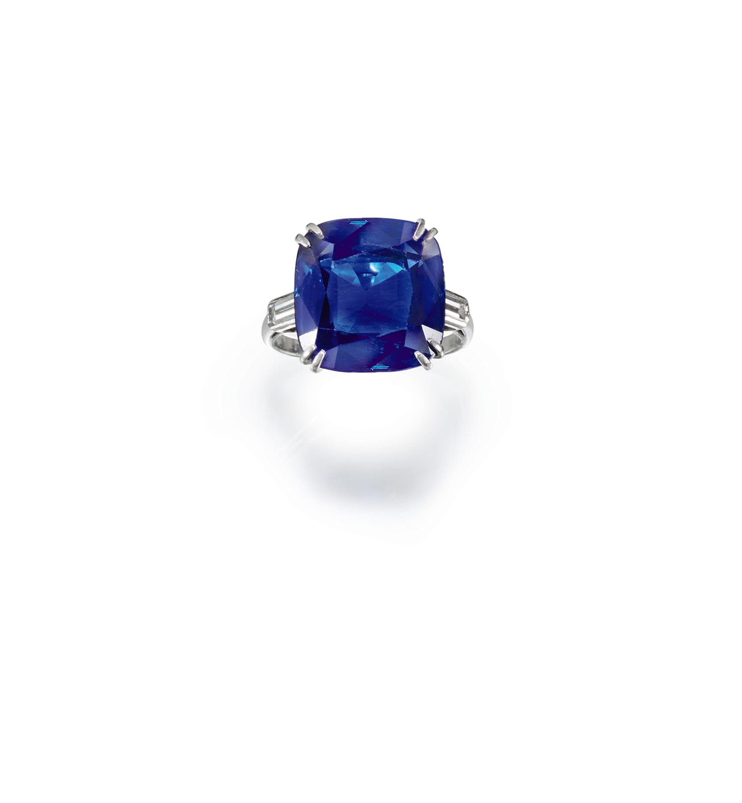 Chaumet, sapphire and diamond ring (1930s), claw-set with a cushion-shaped sapphire weighing 12.83 carats, to baguette diamond shoulders, size 48, signed Chaumet, French assay marks for platinum and partial maker's mark, gross weight approximately 5.84 grams (image courtesy Sotheby's)