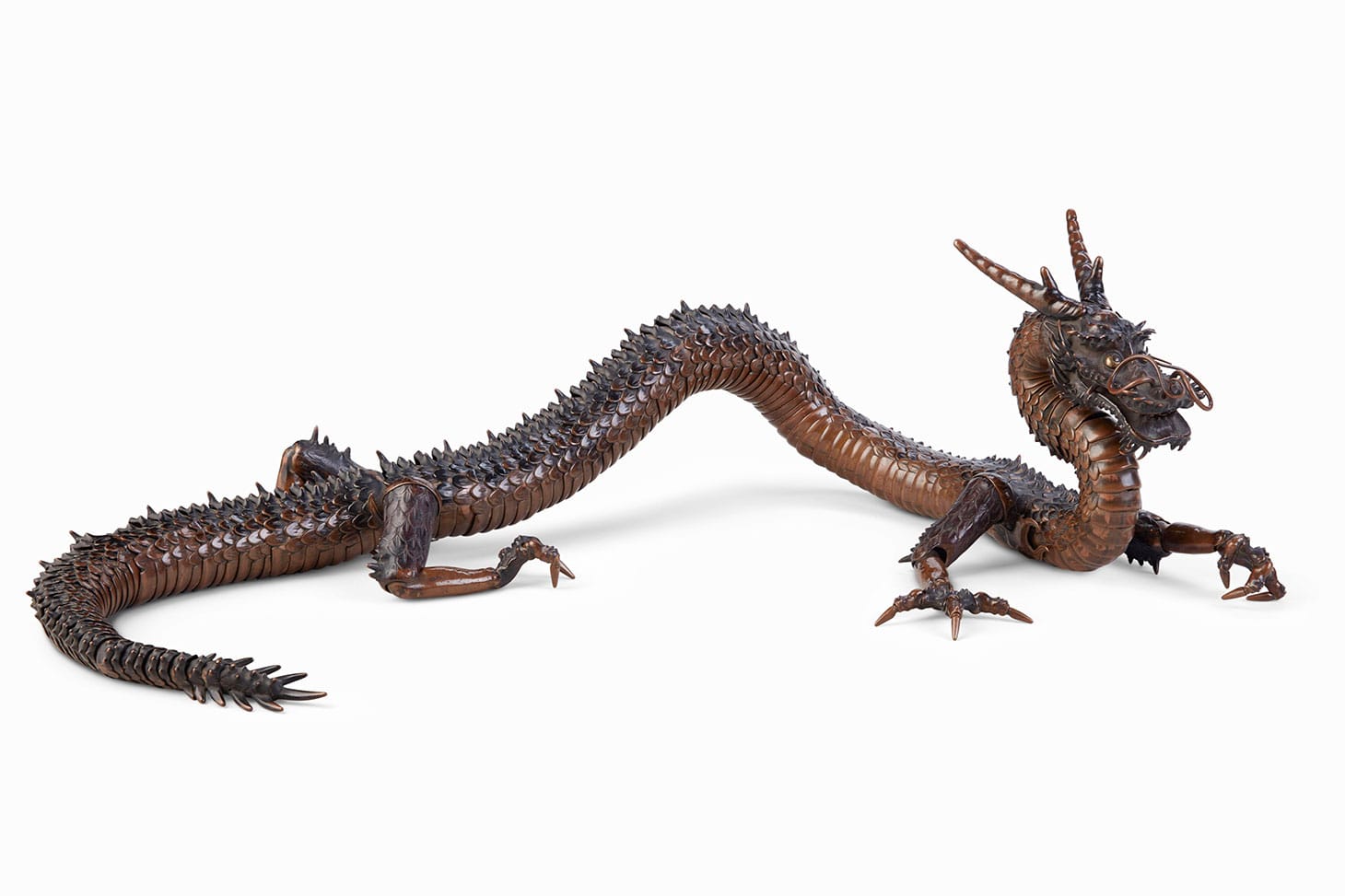 A copper articulated sculpture of a dragon, Meiji-Taisho period (early 20th century), 51 1/4 inches (image courtesy Christie's)