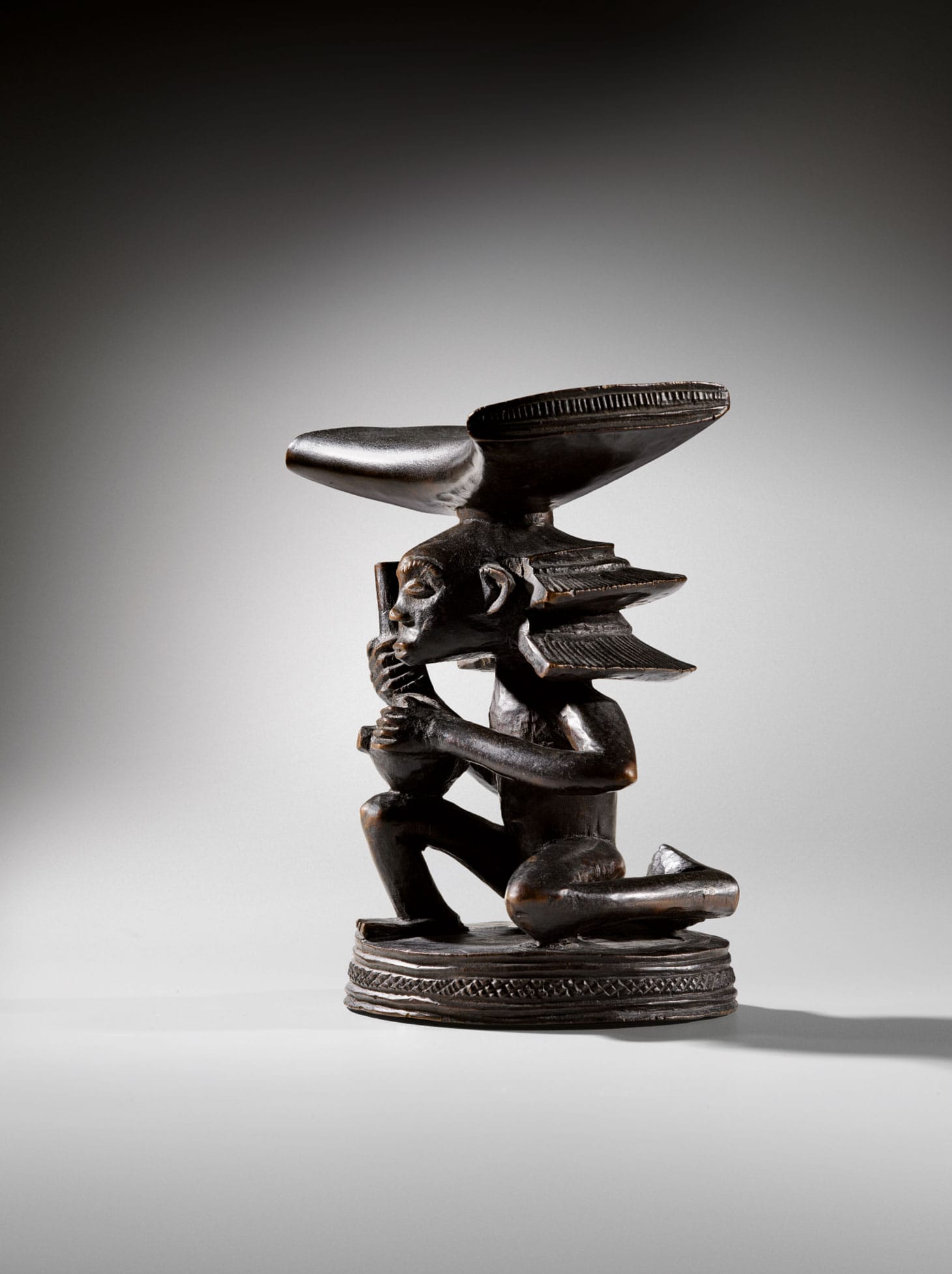 Headrest, Luba-Shankadi, attributed to Master of Cascade Hairdressing, Democratic Republic of Congo, 6 3/4 inches (image courtesy Sotheby's)