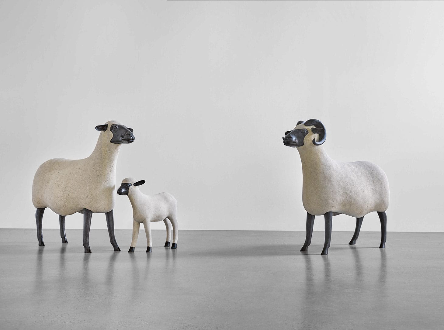 François-Xavier Lalanne, "Brebis" (1996), "Bélier" (1996), and "Agneau" (1997) from the <em>Nouveaux Moutons</em> series, respectively numbered 103 from an edition of 250, 51 from an edition of 250, and 50 from an edition of 500, epoxy stone, patinated bronze, "Brebis": 36 x 16 x 37 1/2 inches, "Bélier": 36 1/4 x 16 x 38 1/2 inches, "Agneau": 20 1/2 x 6 3/4 x 23 1/2 inches (image courtesy Sotheby's)