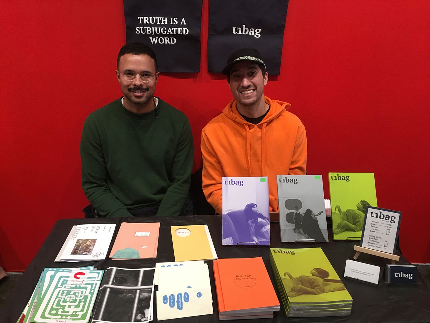 Addison Vawters (left) and Andy Wentz (right) at the <em>unbag</em> table