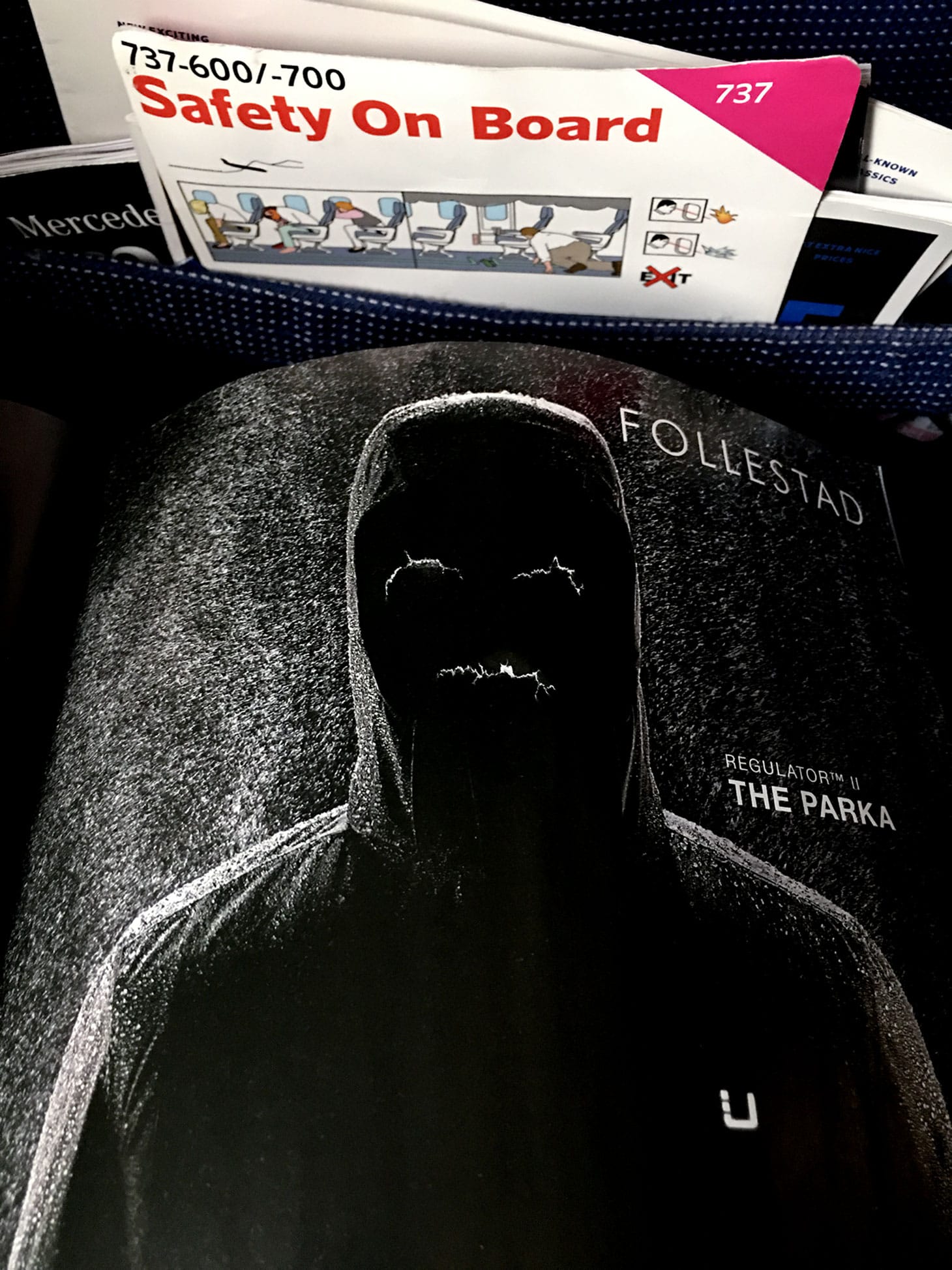 Nina Katchadourian, “Safety on Board” (2012, from “Seat Assignment” project, 2010- ongoing), C-print, 24 x 19 inches