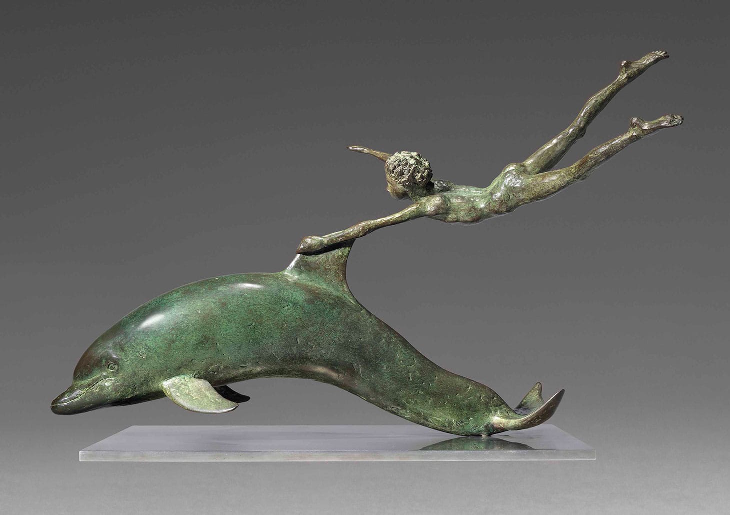 David Wynne, "Boy with a Dolphin" (1972), bronze with a green/brown patina, 23 3/4 inches long, excluding metal base (image courtesy Christie's)