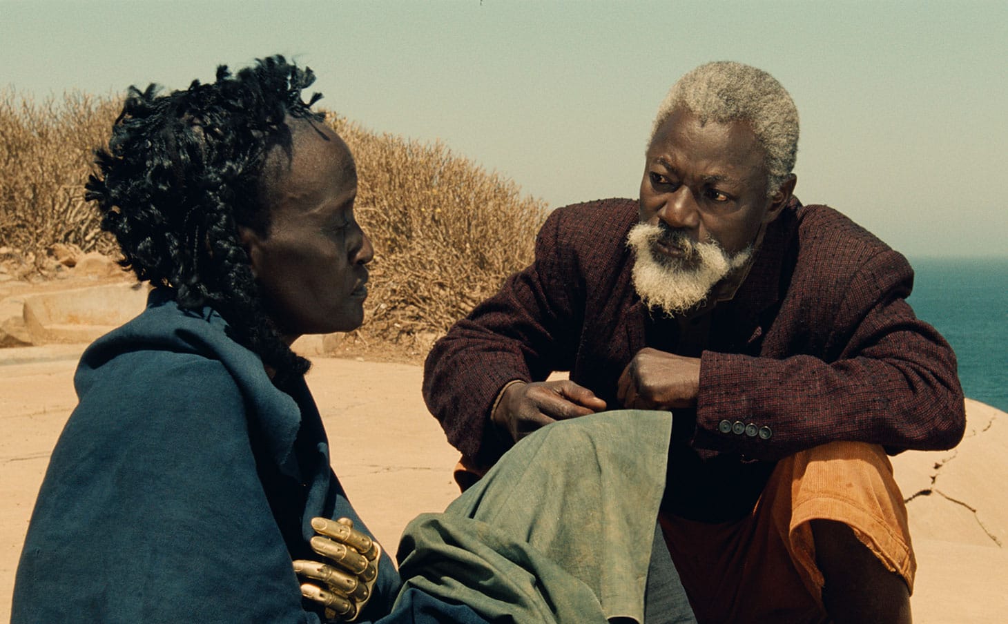 Ami Diakhate (as Linguere Ramatou) and Mansour Diouf (as Dramaan) in <em/>Hyenas, a film by Djibril Diop Mambéty (image courtesy Metrograph Pictures)