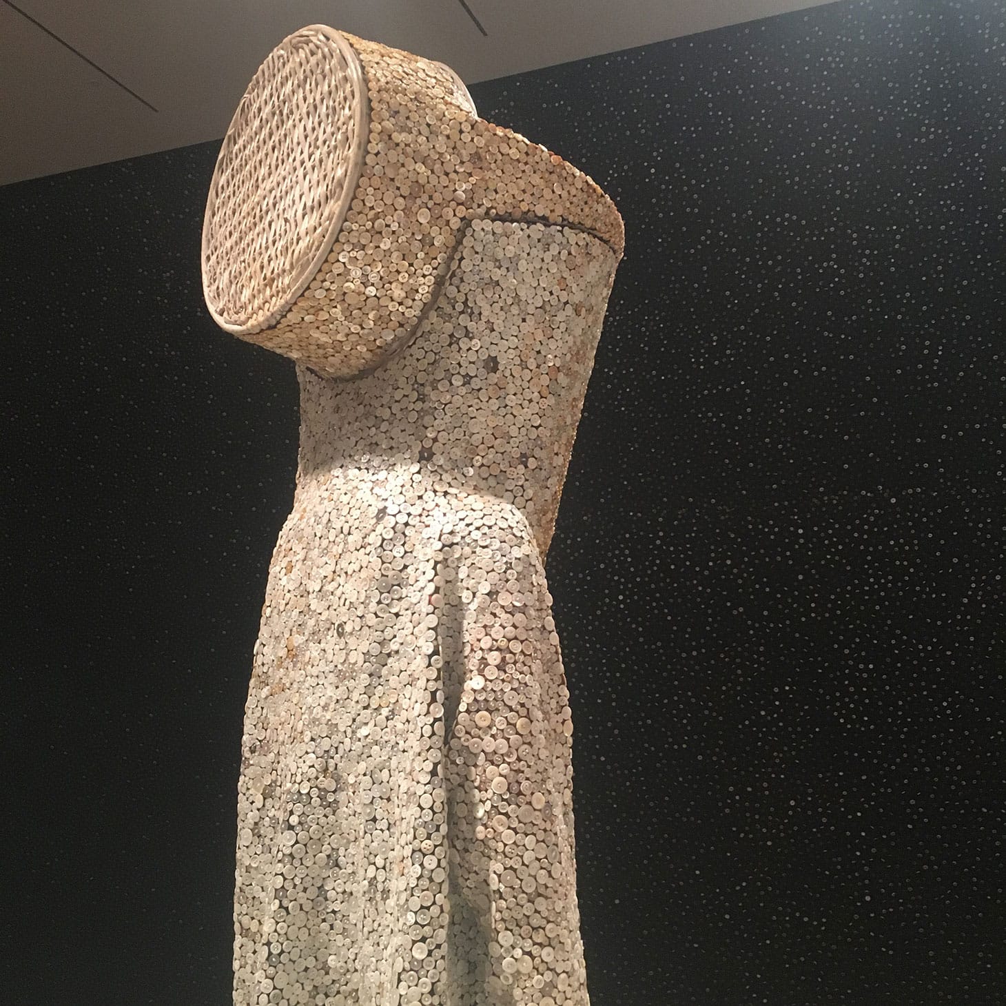 Nick Cave, “Soundsuit” (2010), mixed media, including buttons, basket, upholstery, and mannequin, 90 x 30 x 16 inches