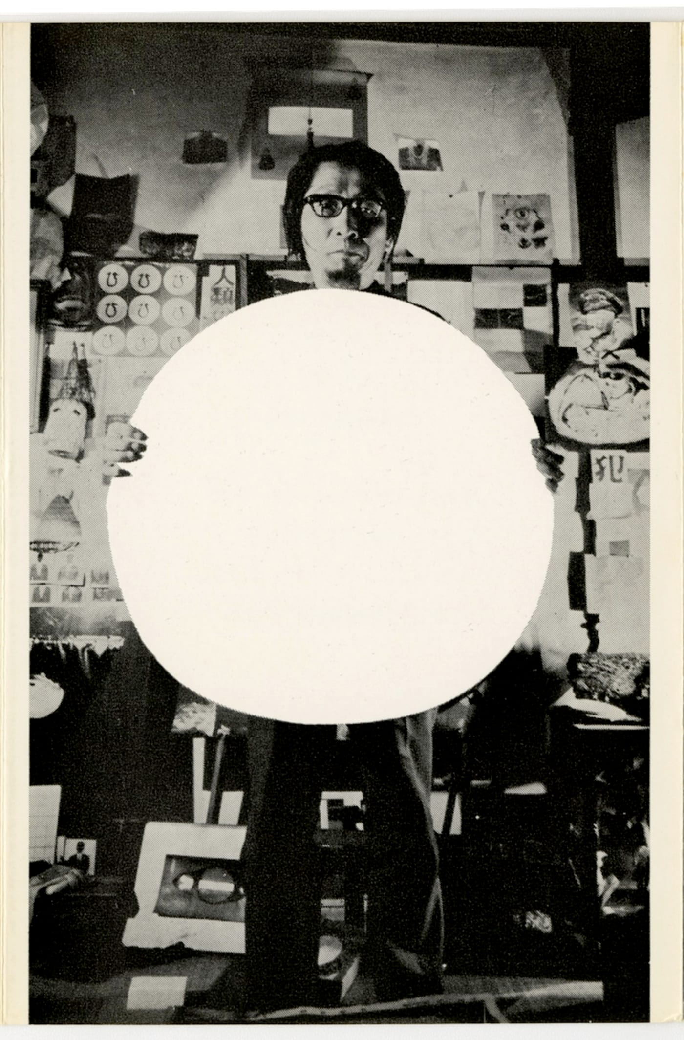Yutaka Matsuzawa with “White Circle” (1969), digital print reproduced from “Y. Matsuzawa,” exhibition brochure published by Aoki Gallery, Tokyo, 1969, 6 x 4 1/8 inches (original photo by Kō Nakajima, this photo courtesy of Japan Society)