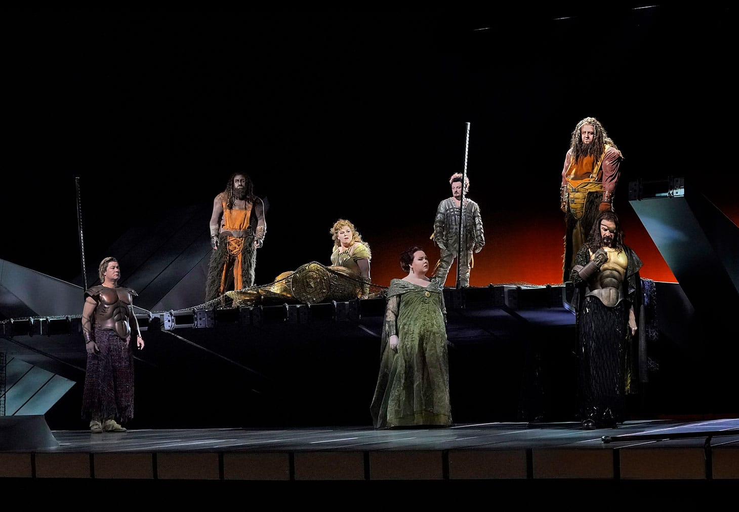Adam Diegel as Froh, Günther Groissböck as Fasolt, Wendy Bryn Harmer as Freia, Jamie Barton as Fricka, Norbert Ernst as Loge, Dmitry Belosselskiy as Fafner, and Greer Grimsley as Wotan in Wagner's <em/>Das Rheingold (all photos by Ken Howard / Met Opera)